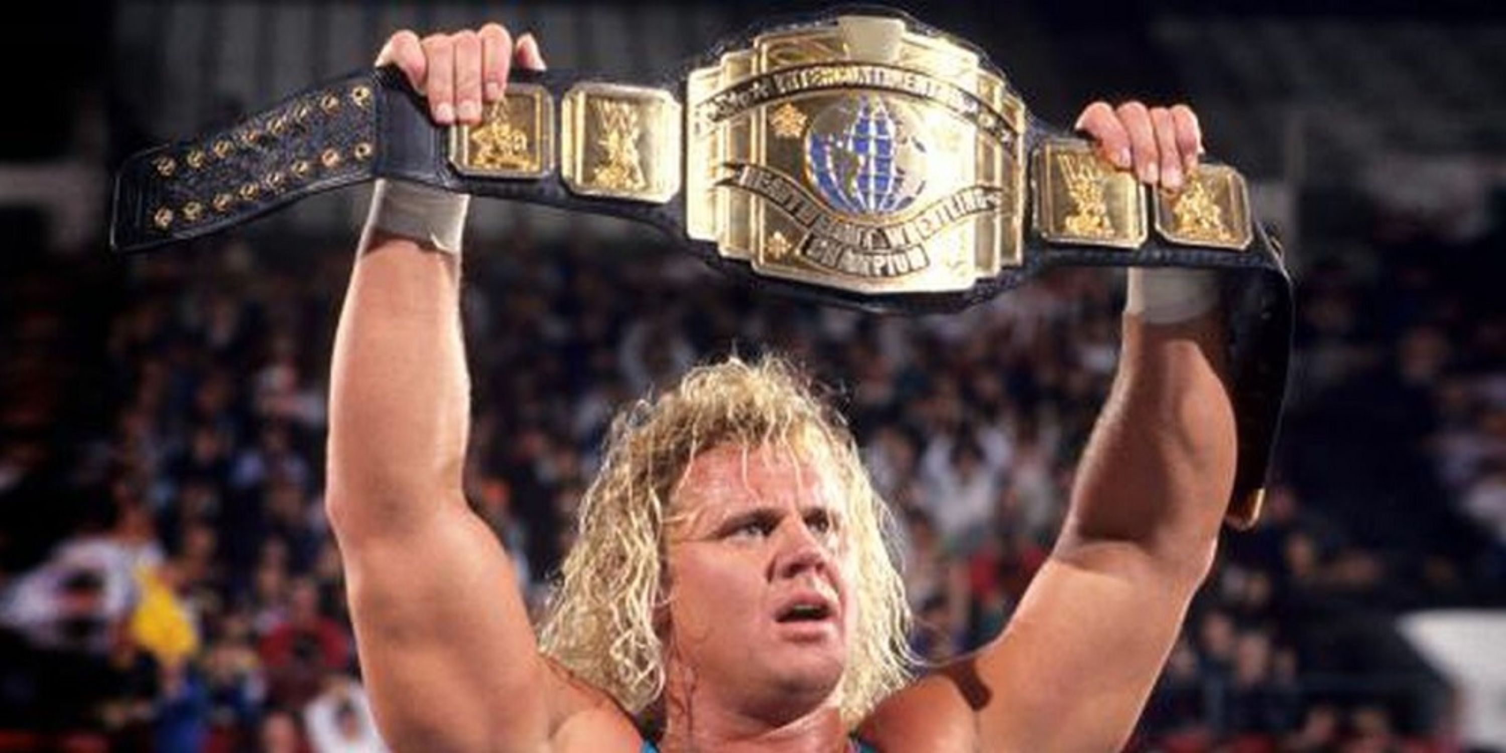 Mr Perfect raises the Intercontinental Championship