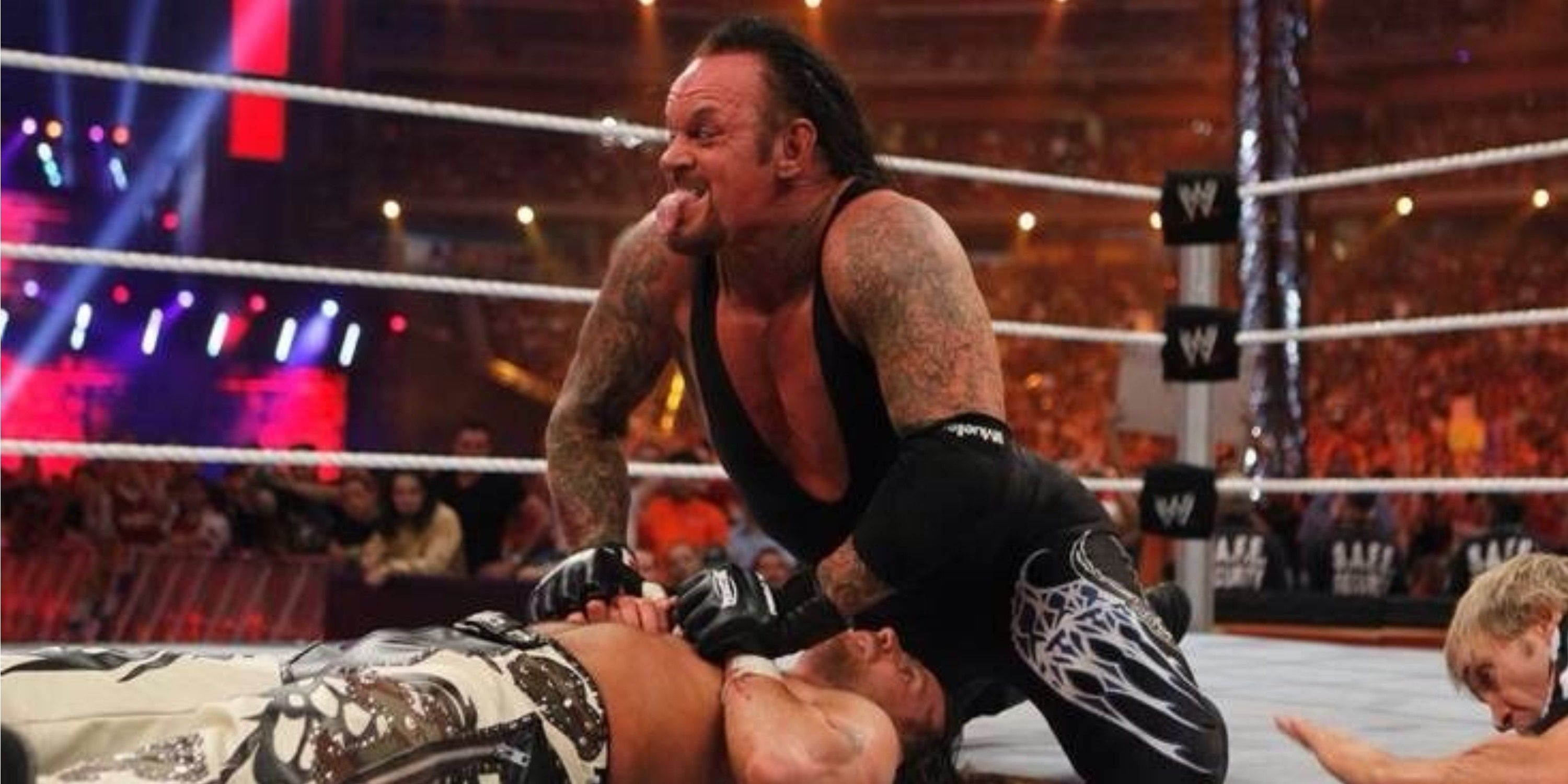 The Undertaker hits a Tombstone on Shawn Michaels on WrestleMania 26