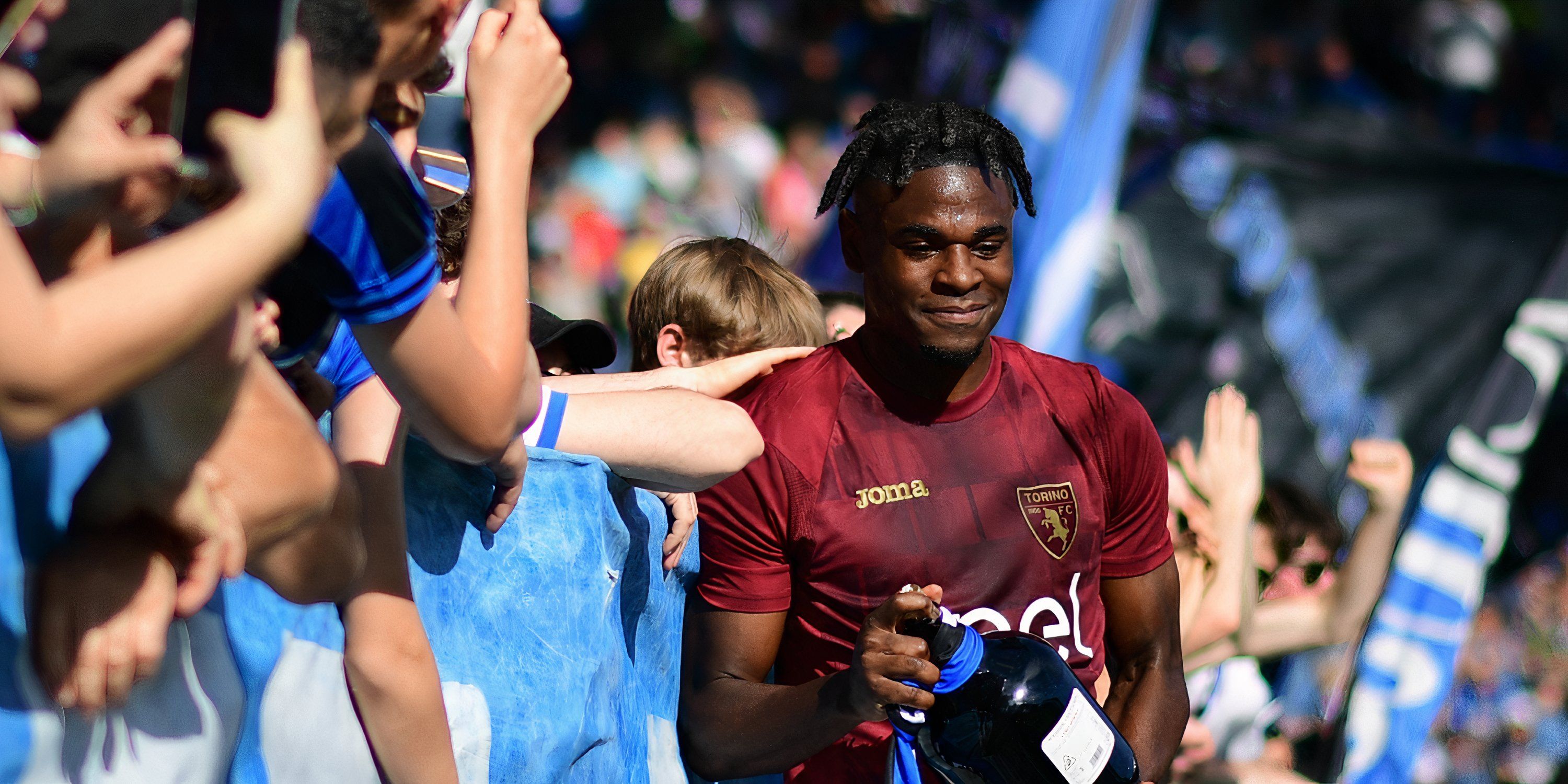 Torino's Duvan Zapata is heralded by Atalanta fans