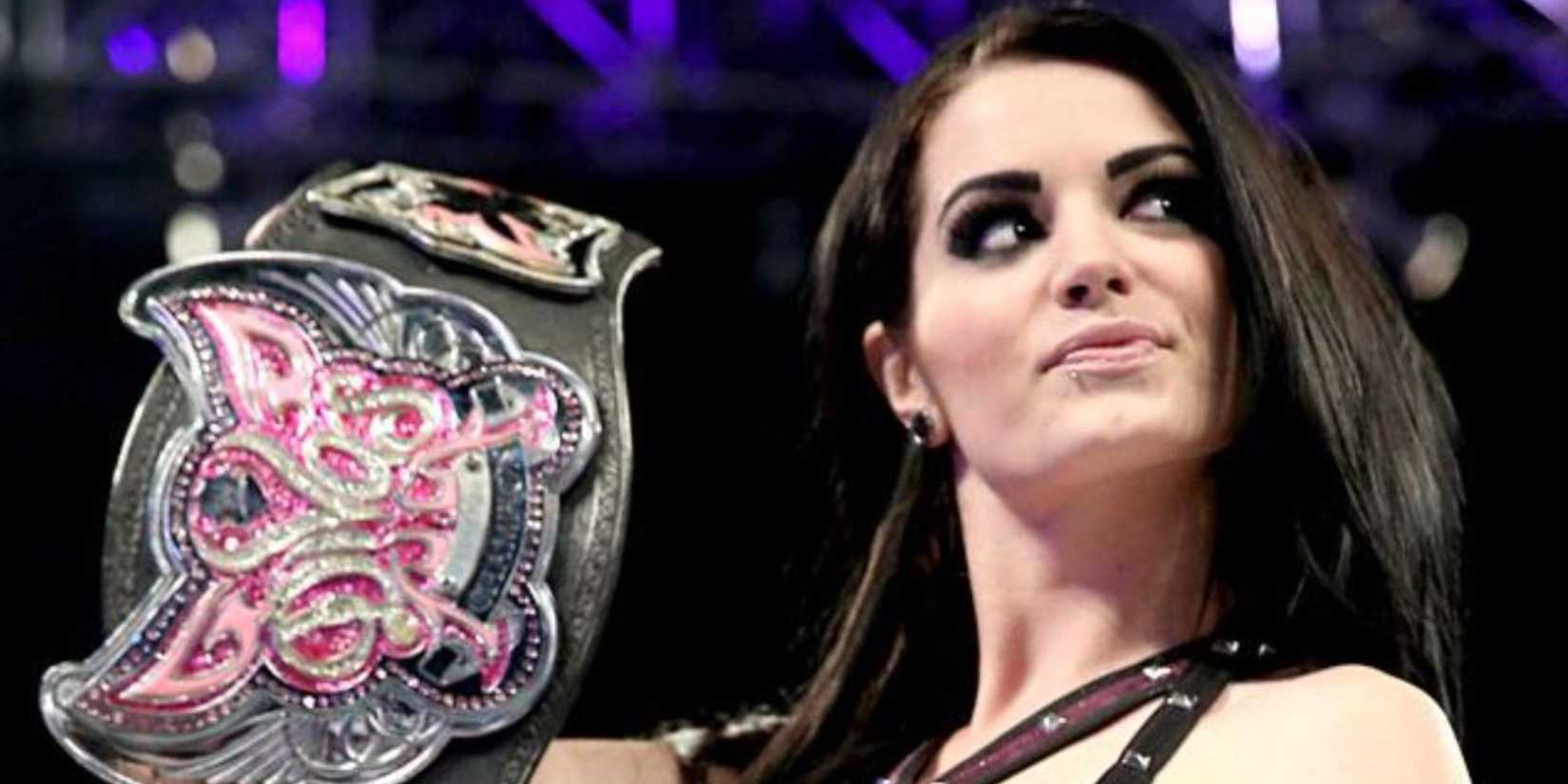 Paige holding the WWE Divas Championship