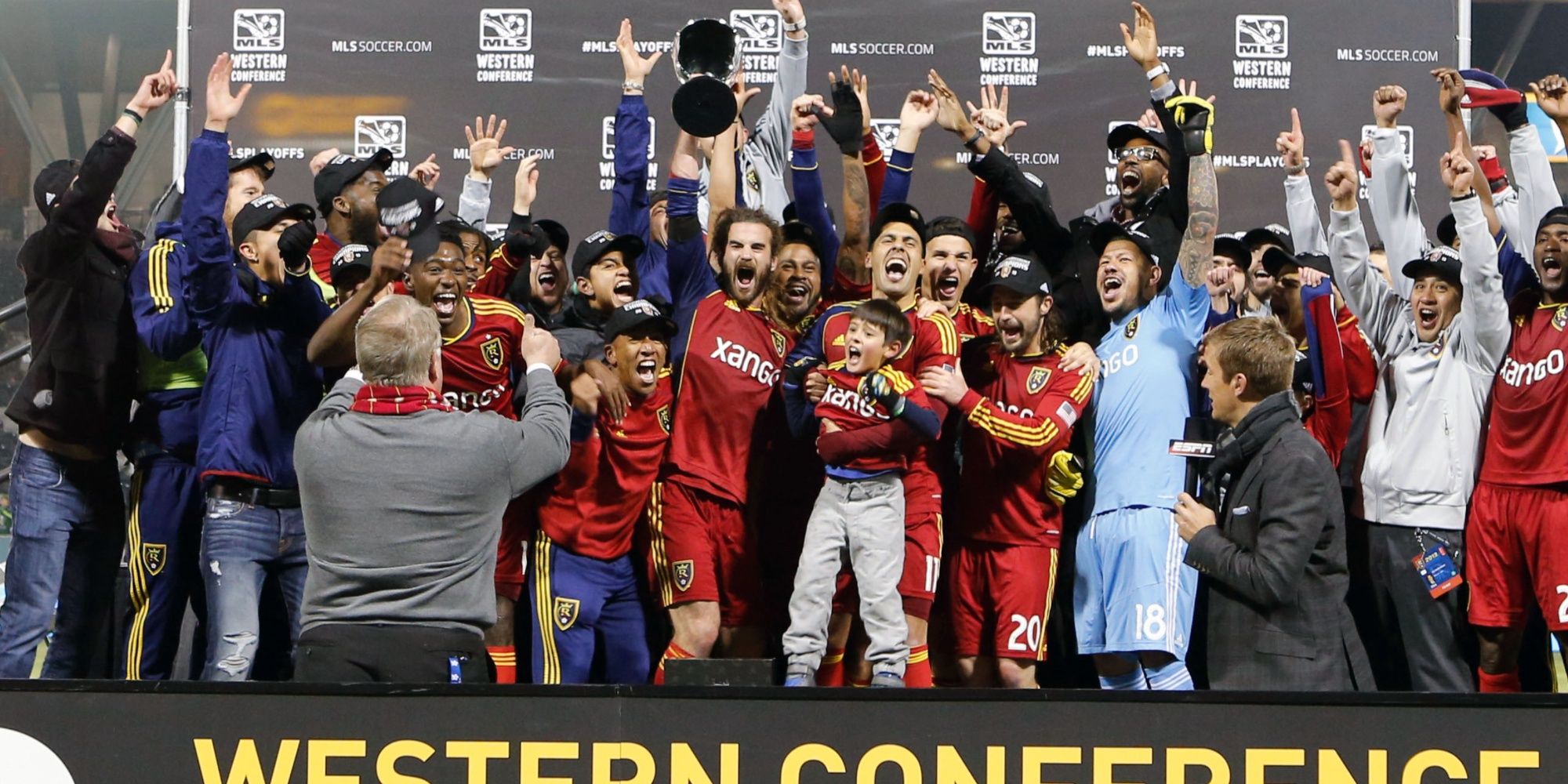 Real Salt Lake players lift the MLS Western Conference Championship trophy after defeating the Portland Timbers 5-2 on aggregate goals at Jeld-Wen Field