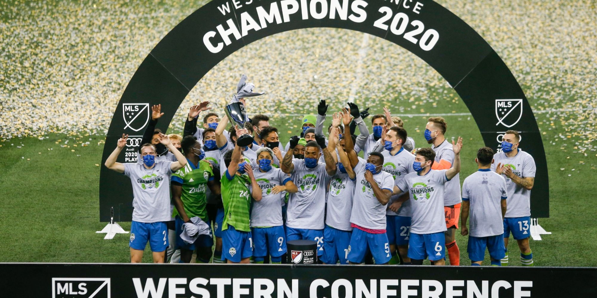Seattle Sounders FC players celebrate following a 3-2 victory against the Minnesota United in the Western Conference Finals at Lumen Field