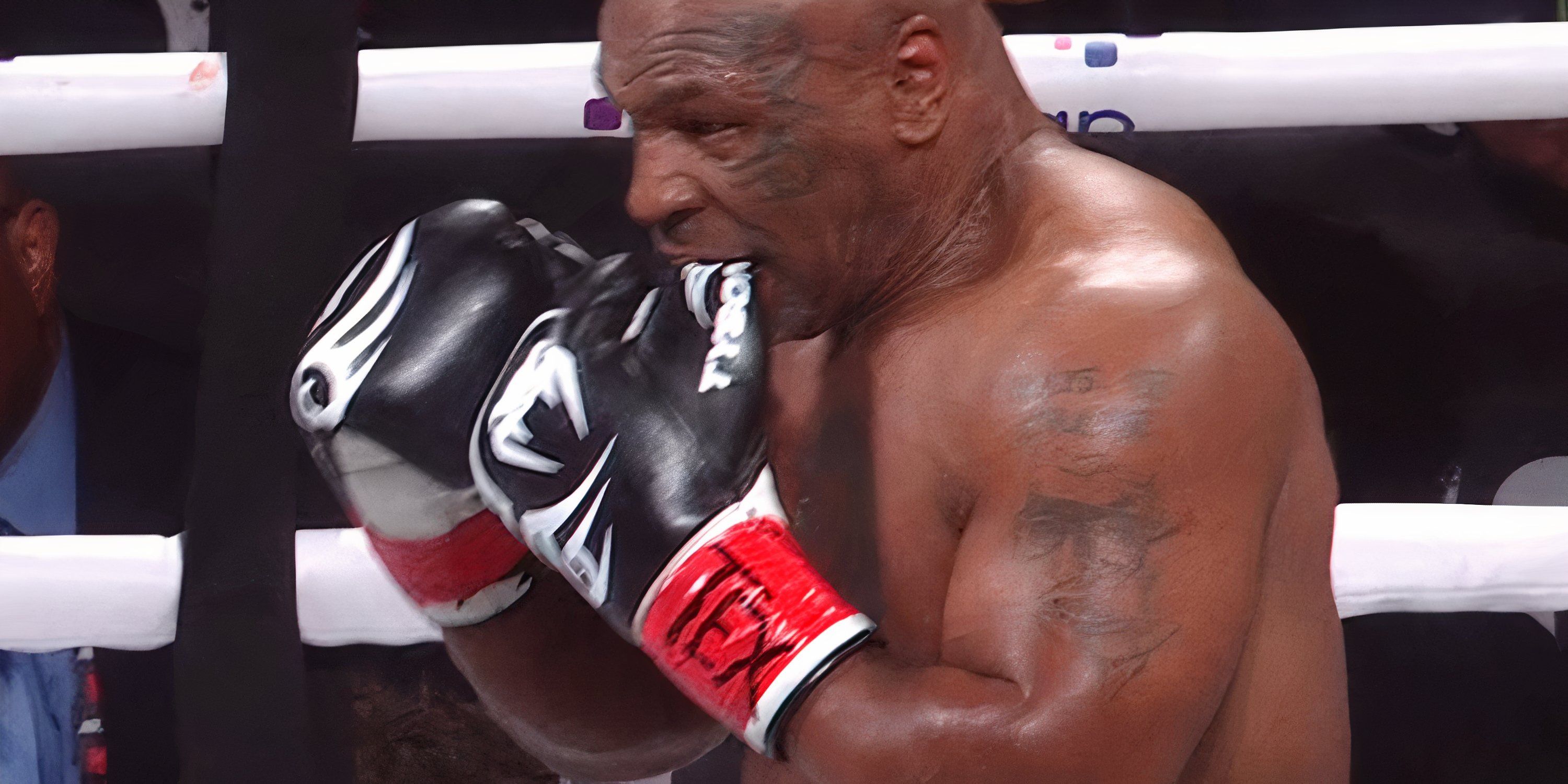 Mike Tyson biting his glove