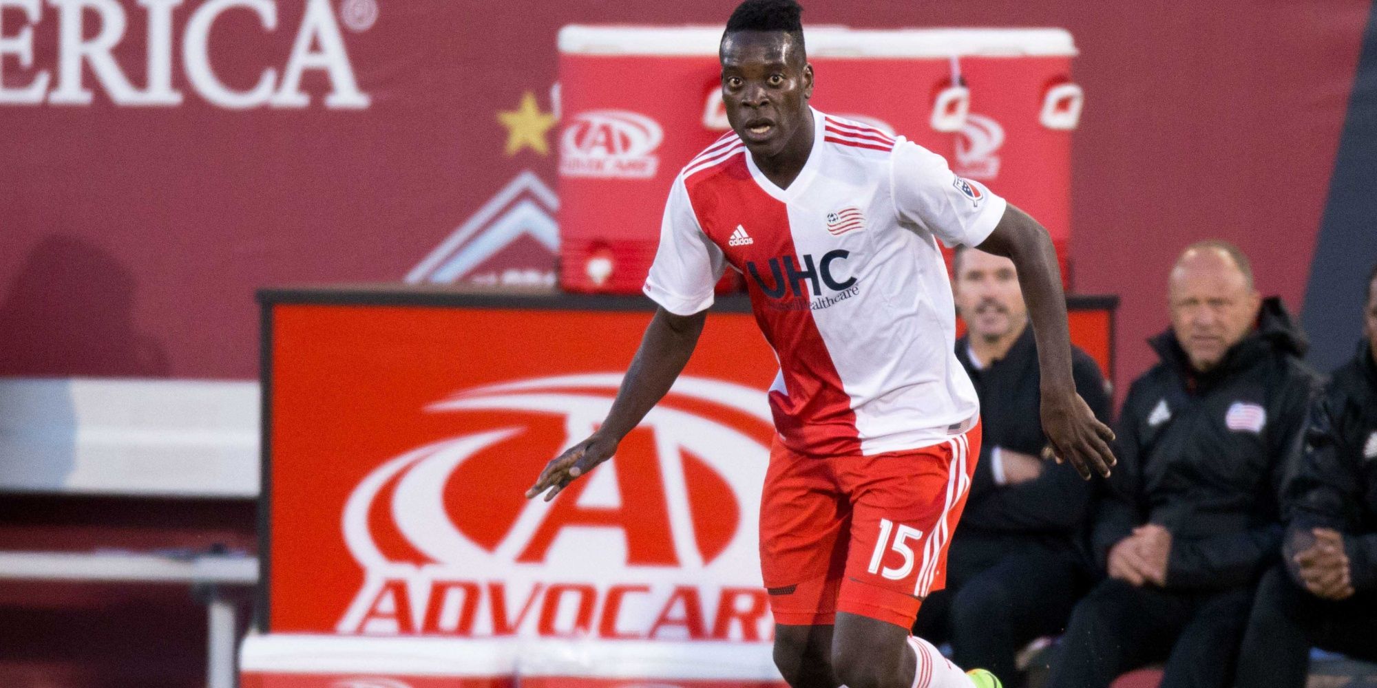 New England Revolution midfielder Je-Vaughn Watson (15) controls the ball in the second half against the Colorado Rapids at Dick's Sporting Goods Park