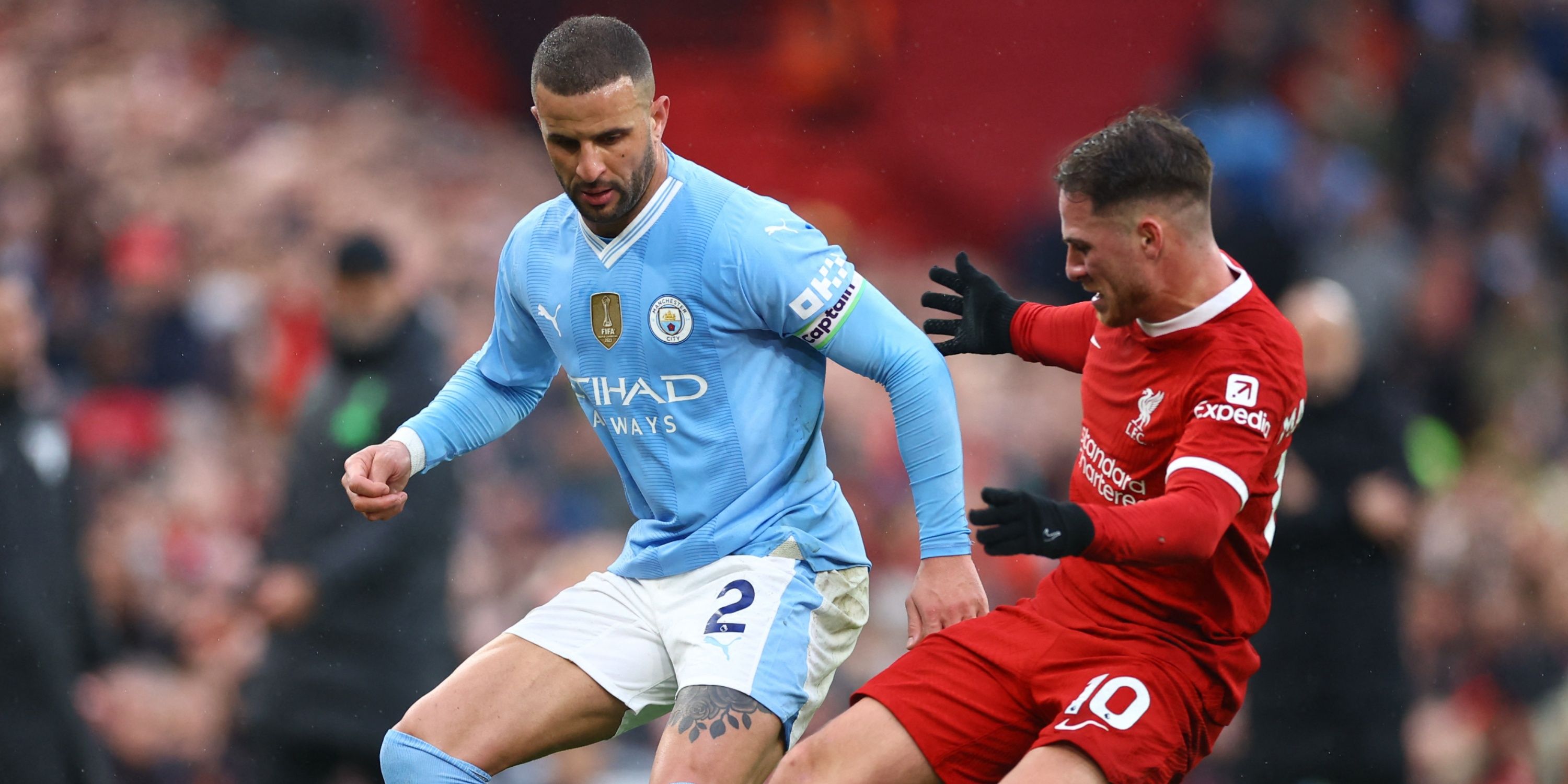 Manchester City's Kyle Walker and Liverpool's Alexis Mac Allister.