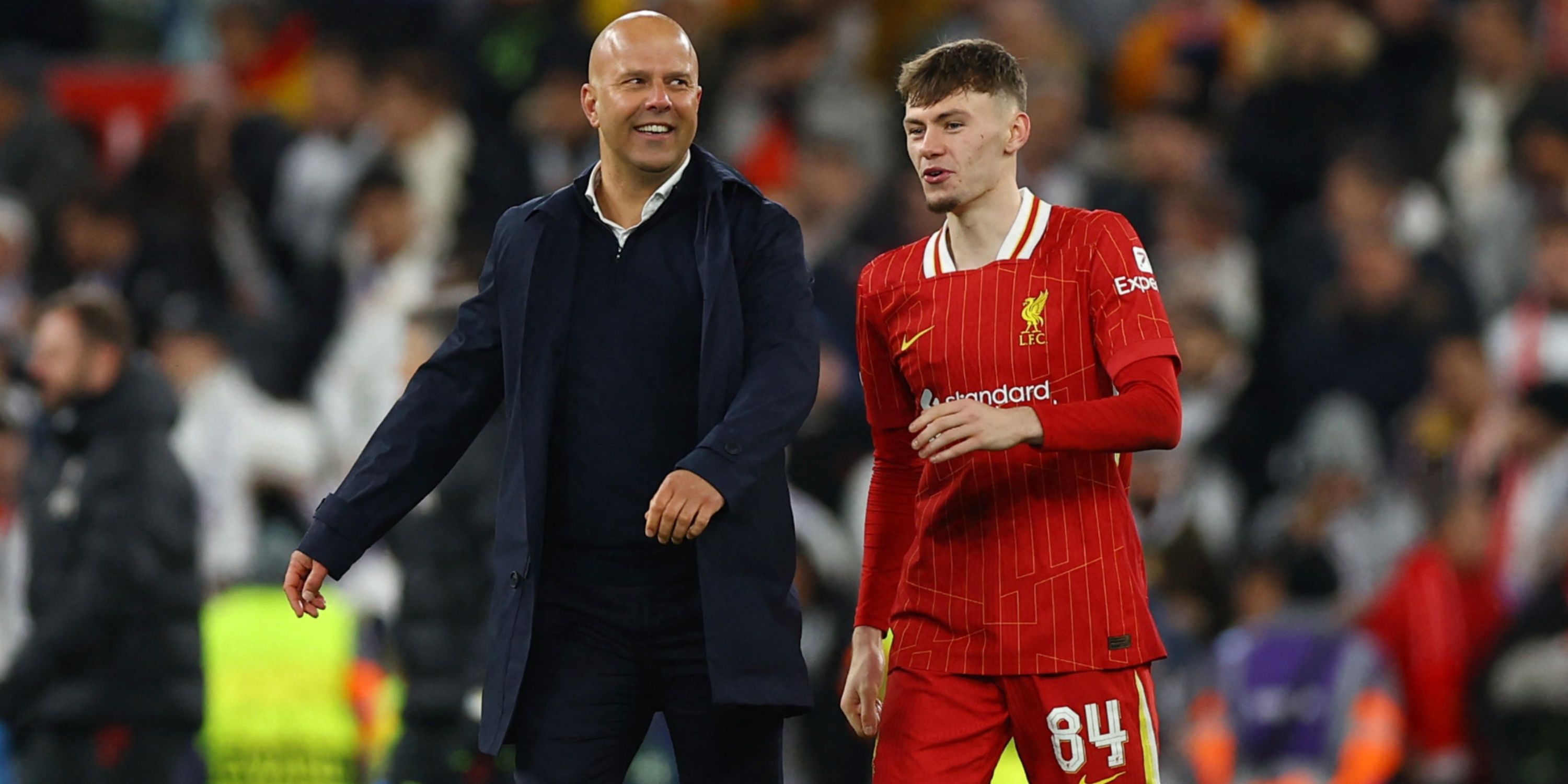 Liverpool manager Arne Slot and Conor Bradley celebrate after the match