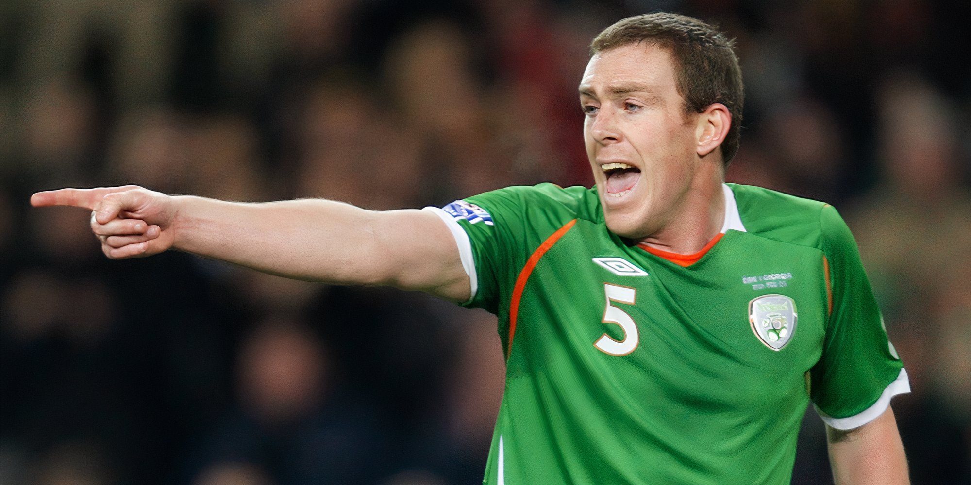 Richard Dunne delivers instructions playing for Ireland