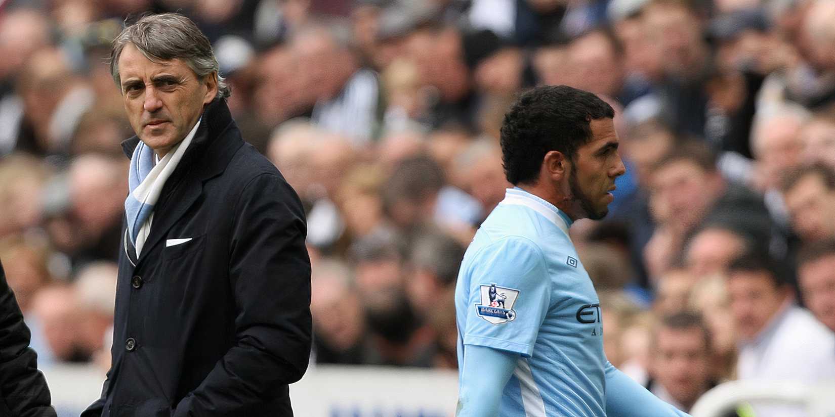 Roberto Mancini and Carlos Tevez