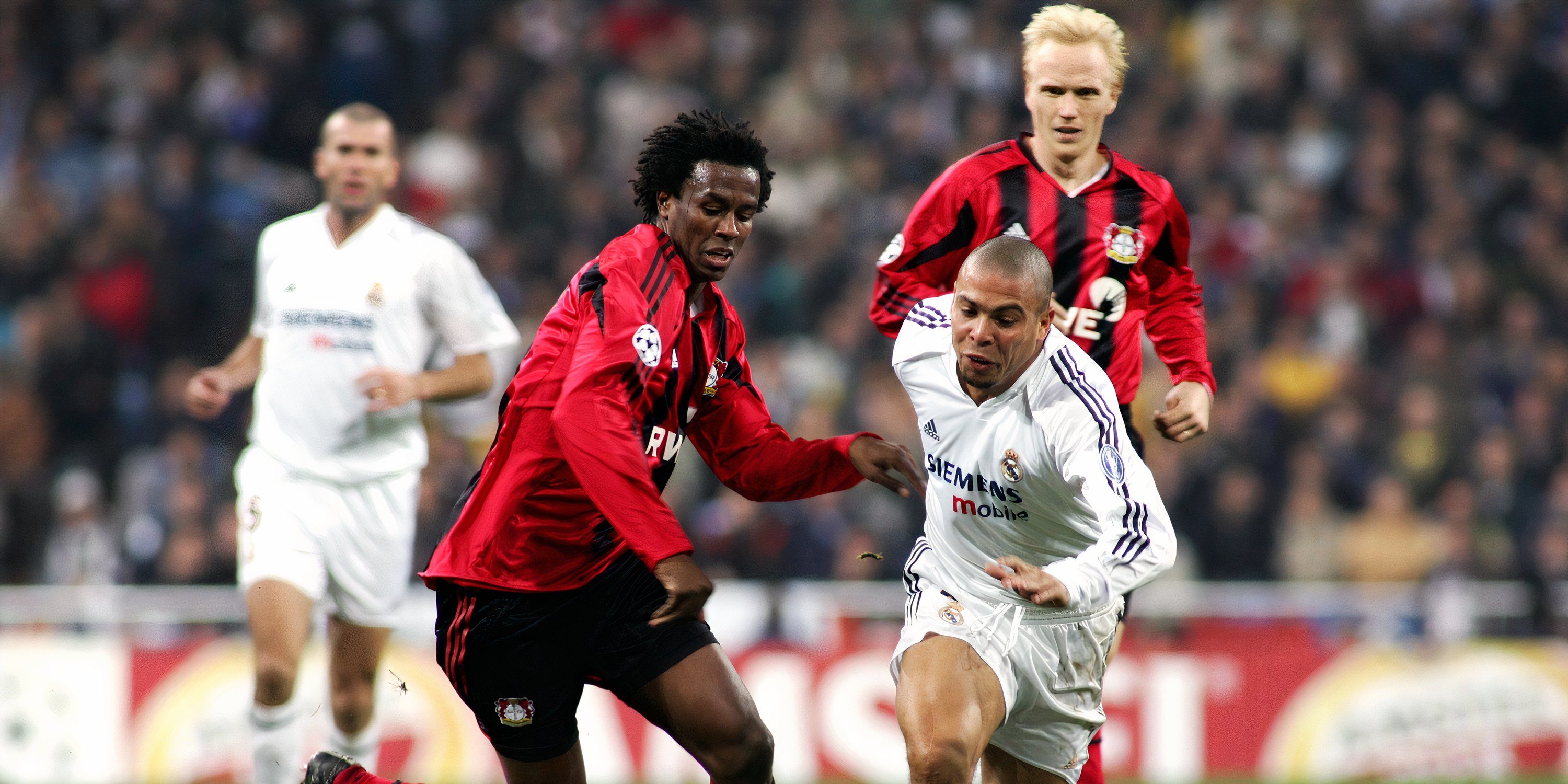 Roque Junior for Bayer Leverkusen in action against Ronaldo Nazario for Real Madrid