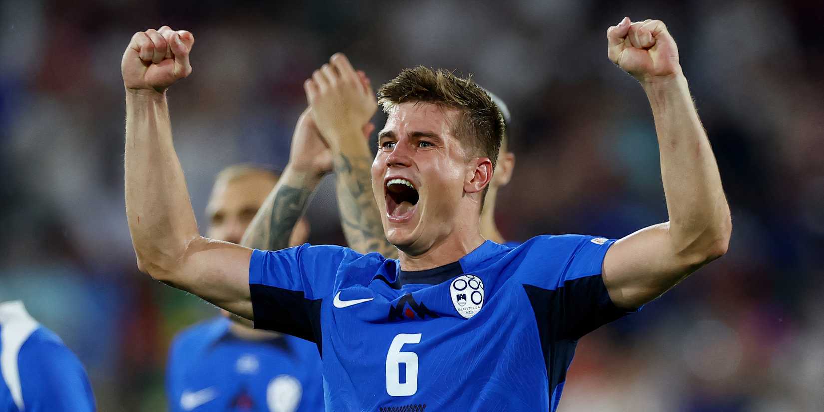 Slovenia defender Jaka Bijol celebrating