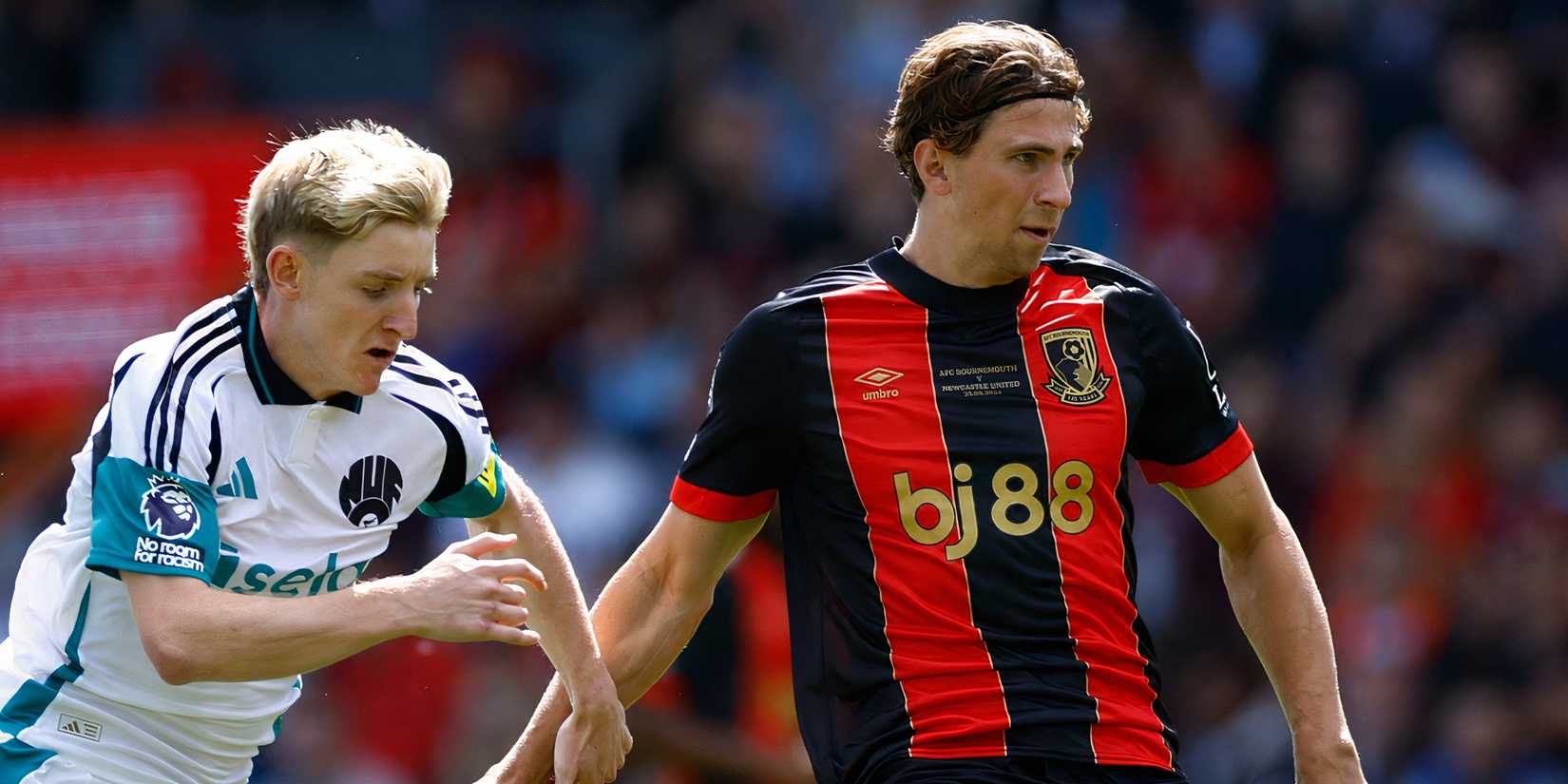 Newcastle United winger Anthony Gordon and Bournemouth defender Illia Zabarnyi battling for possession