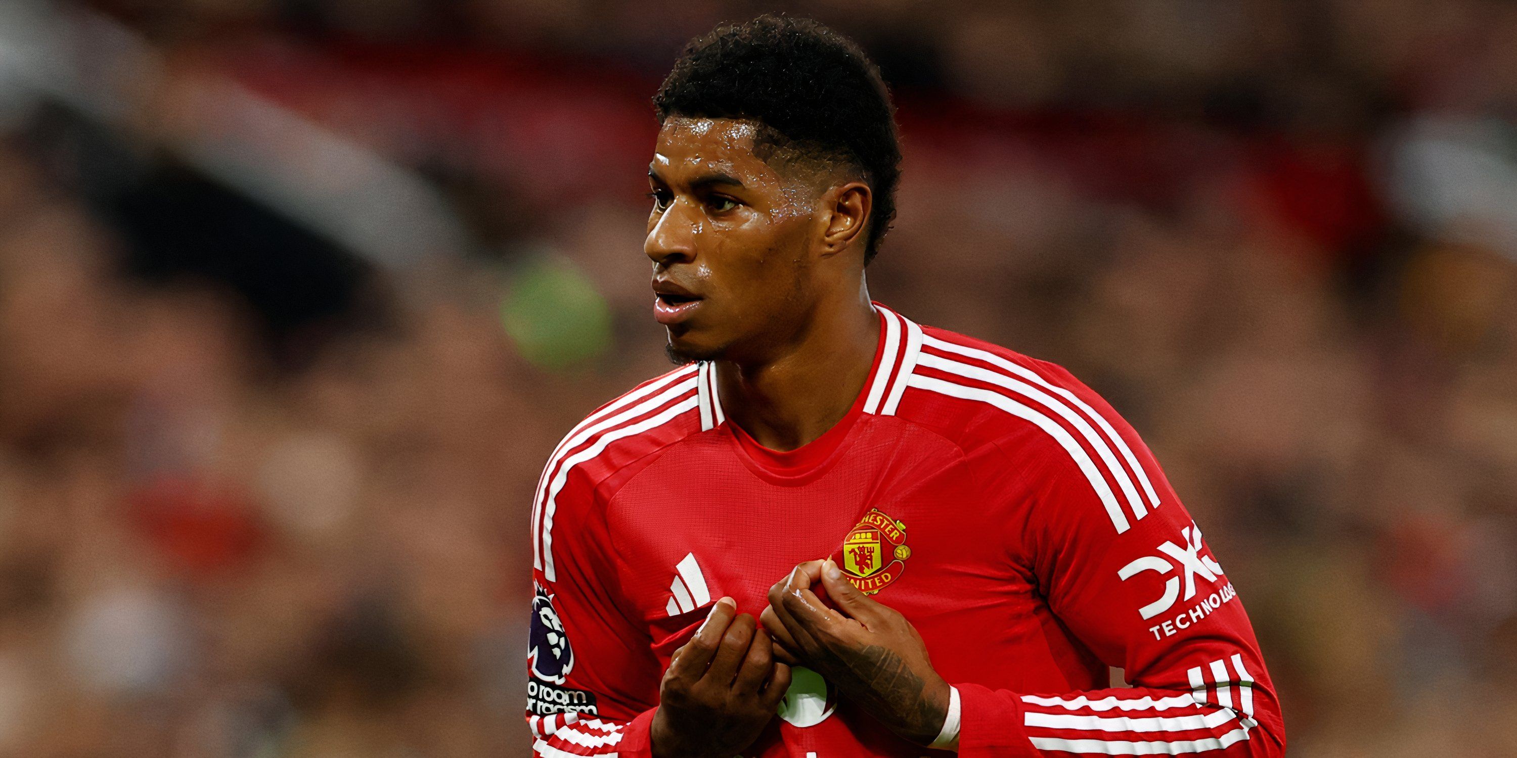 Manchester United winger Marcus Rashford questioning a refereeing decision