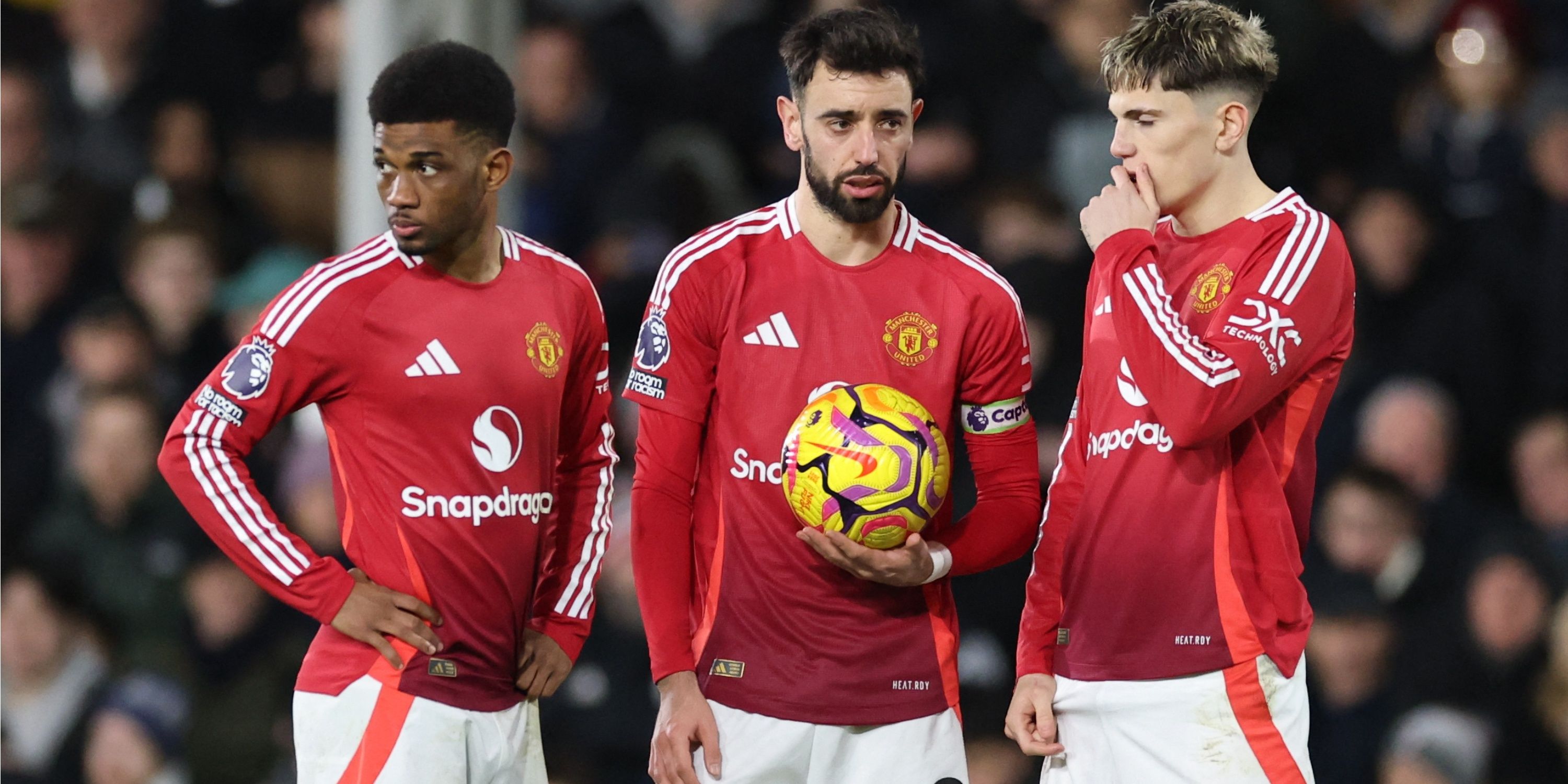 Bruno Fernandes, Alejandro Garnacho and Amad Diallo in conversation for Manchester United