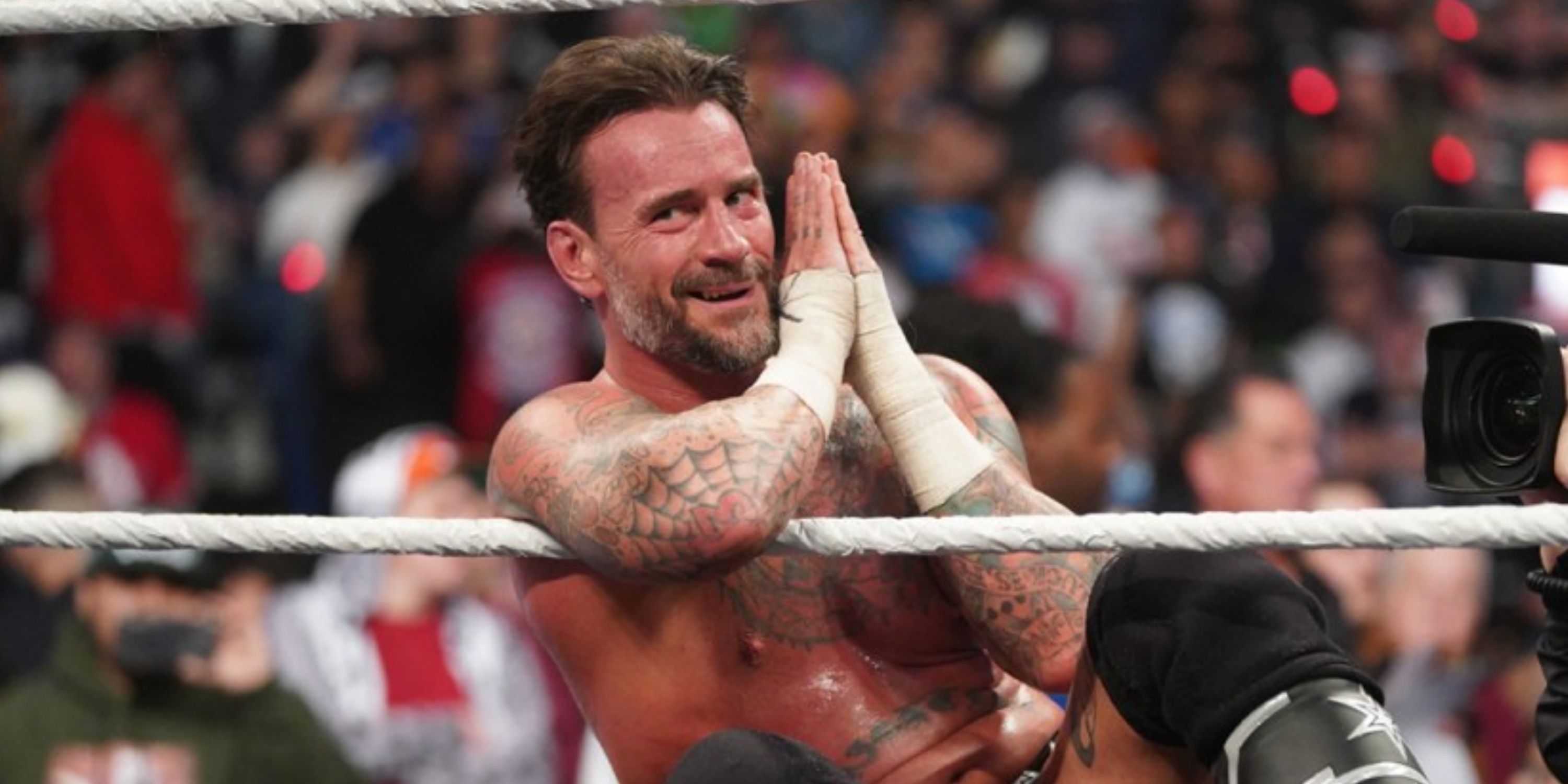 CM Punk doing his 'go to sleep' gesture.