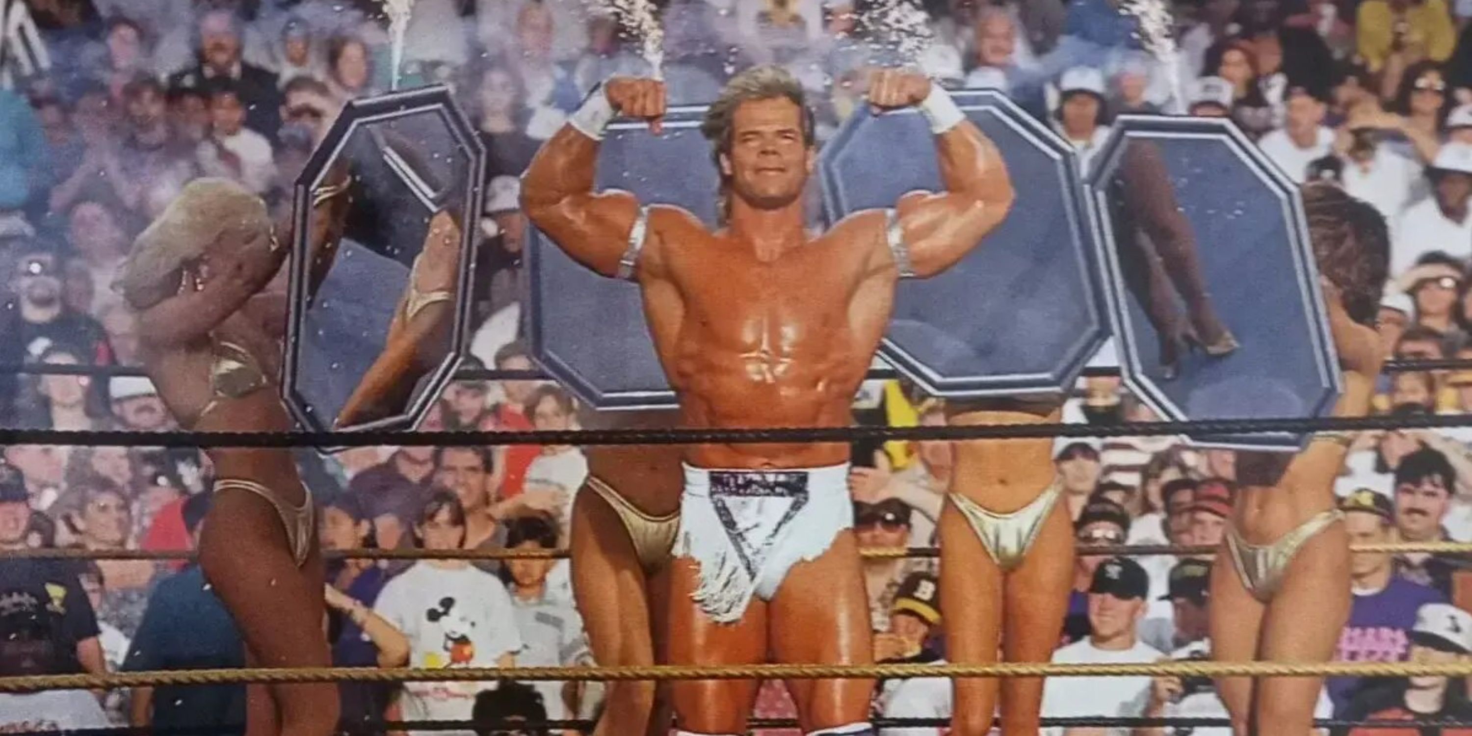 WWE's Lex Luger flexing his muscles.