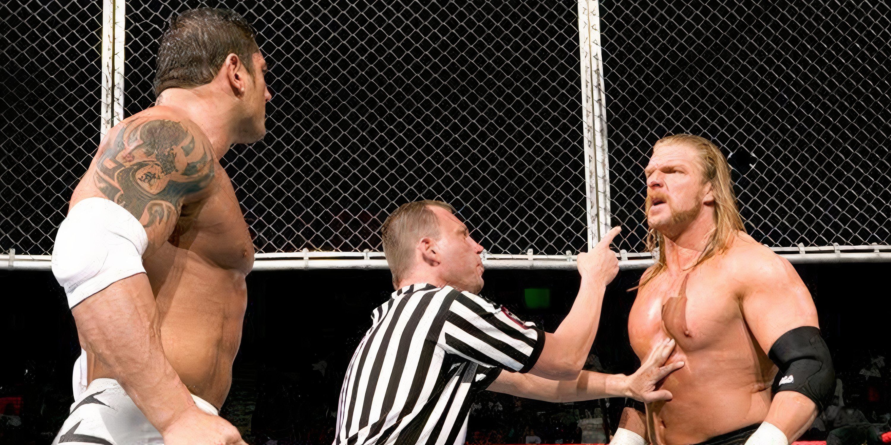 Triple H and Batista face-off before their Hell In A Cell match.