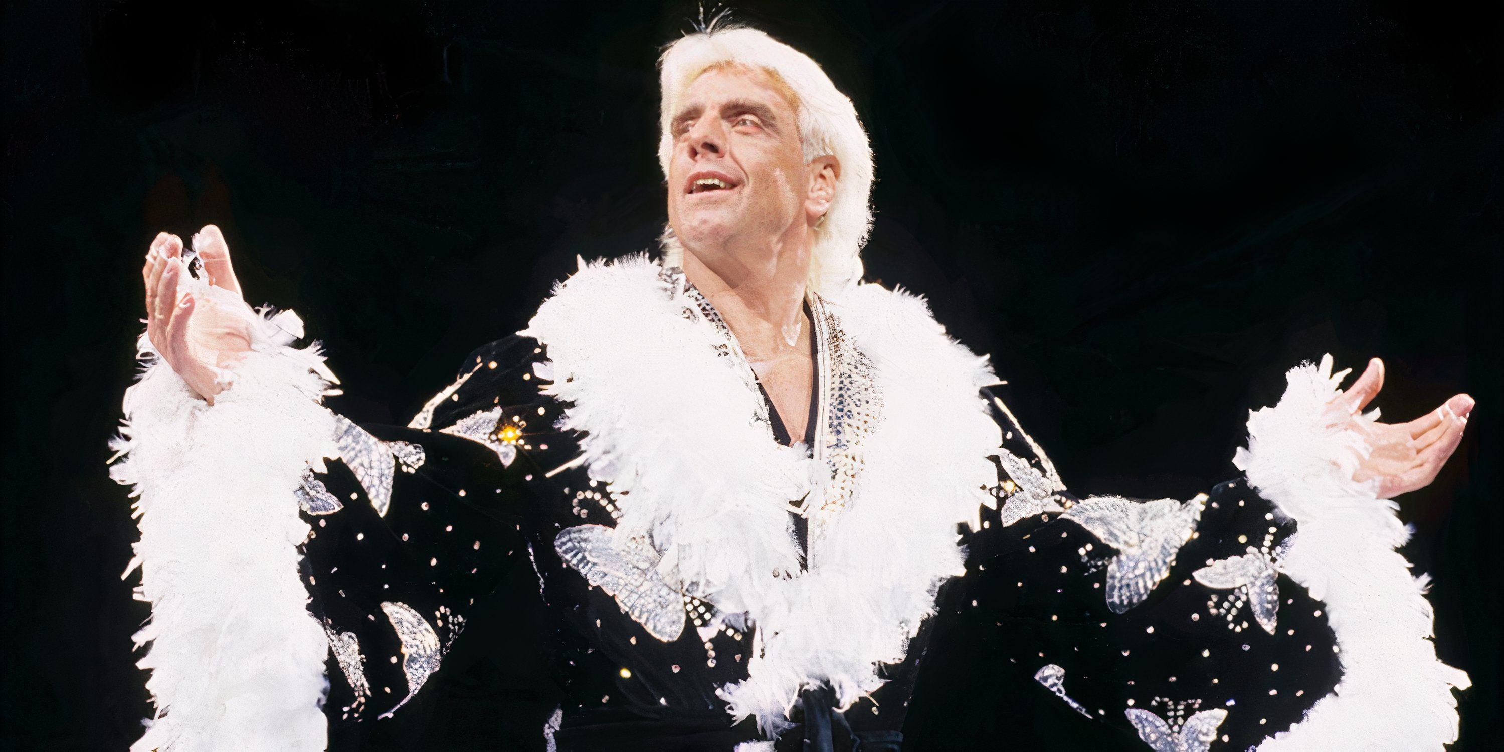 WWE Hall of Famer Ric Flair poses before a match.