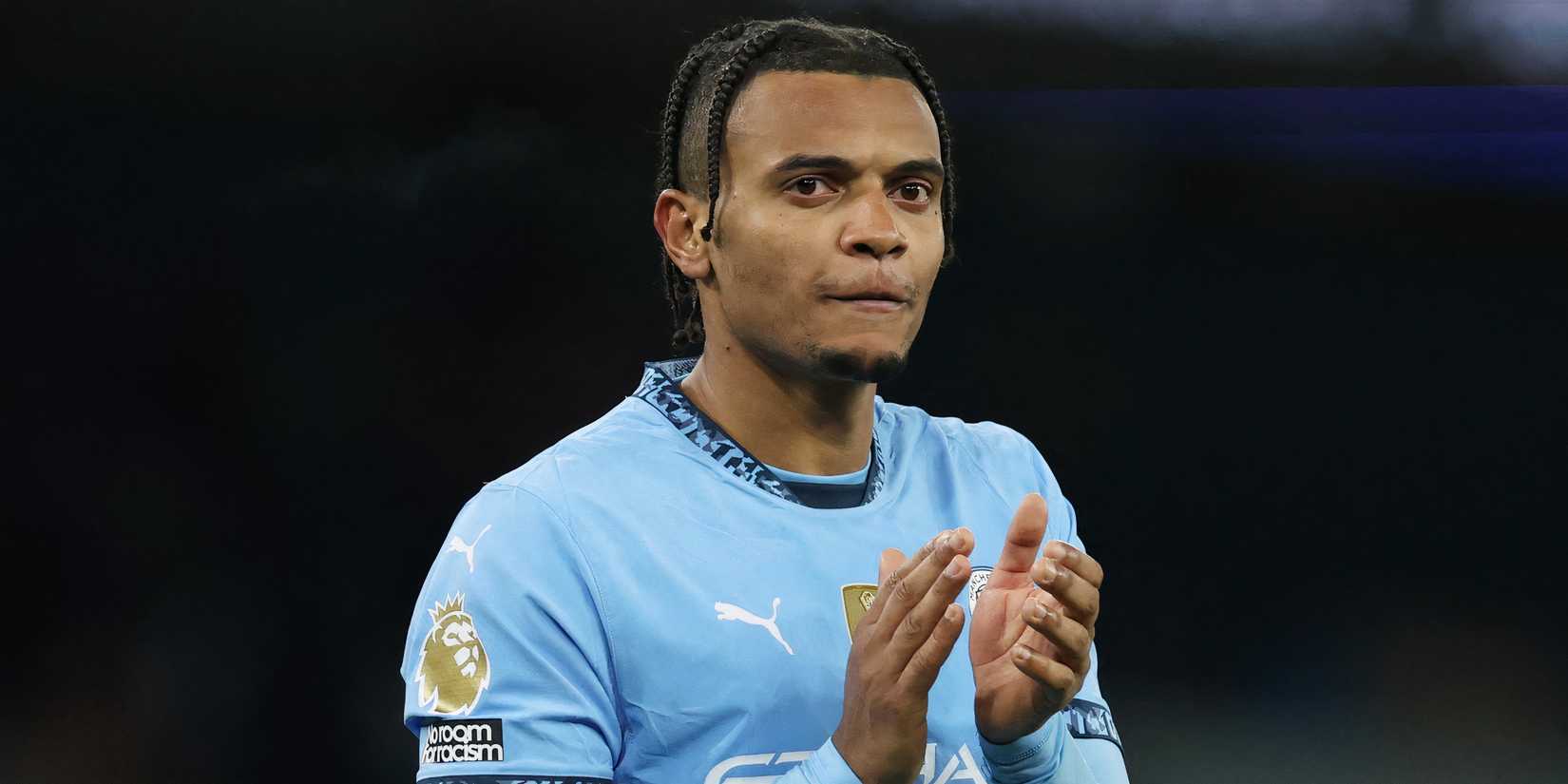 Manuel Akanji applauding the Manchester City supporters