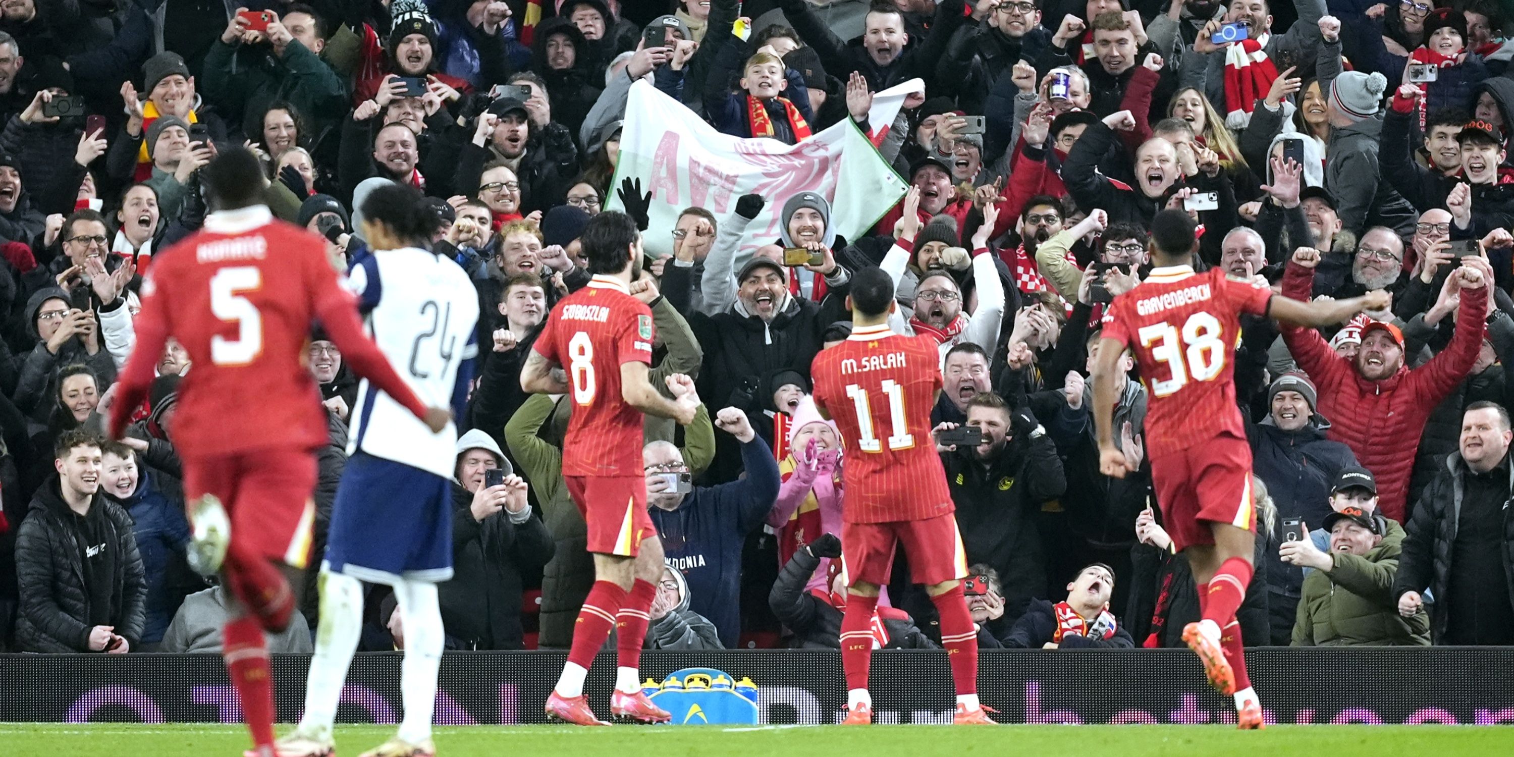 Liverpool players celebrating in the EFL Cup against Tottenham