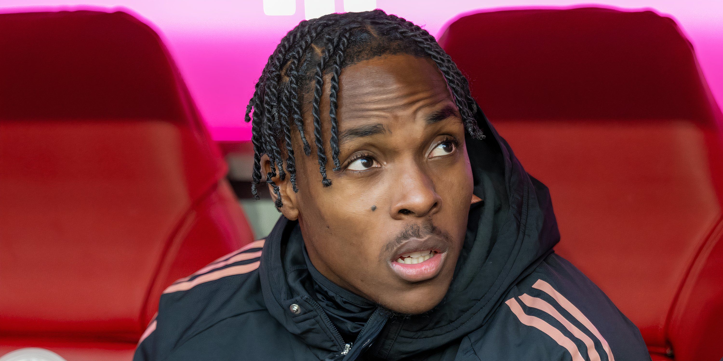 Mathys Tel watching on from the bench at Bayern Munich