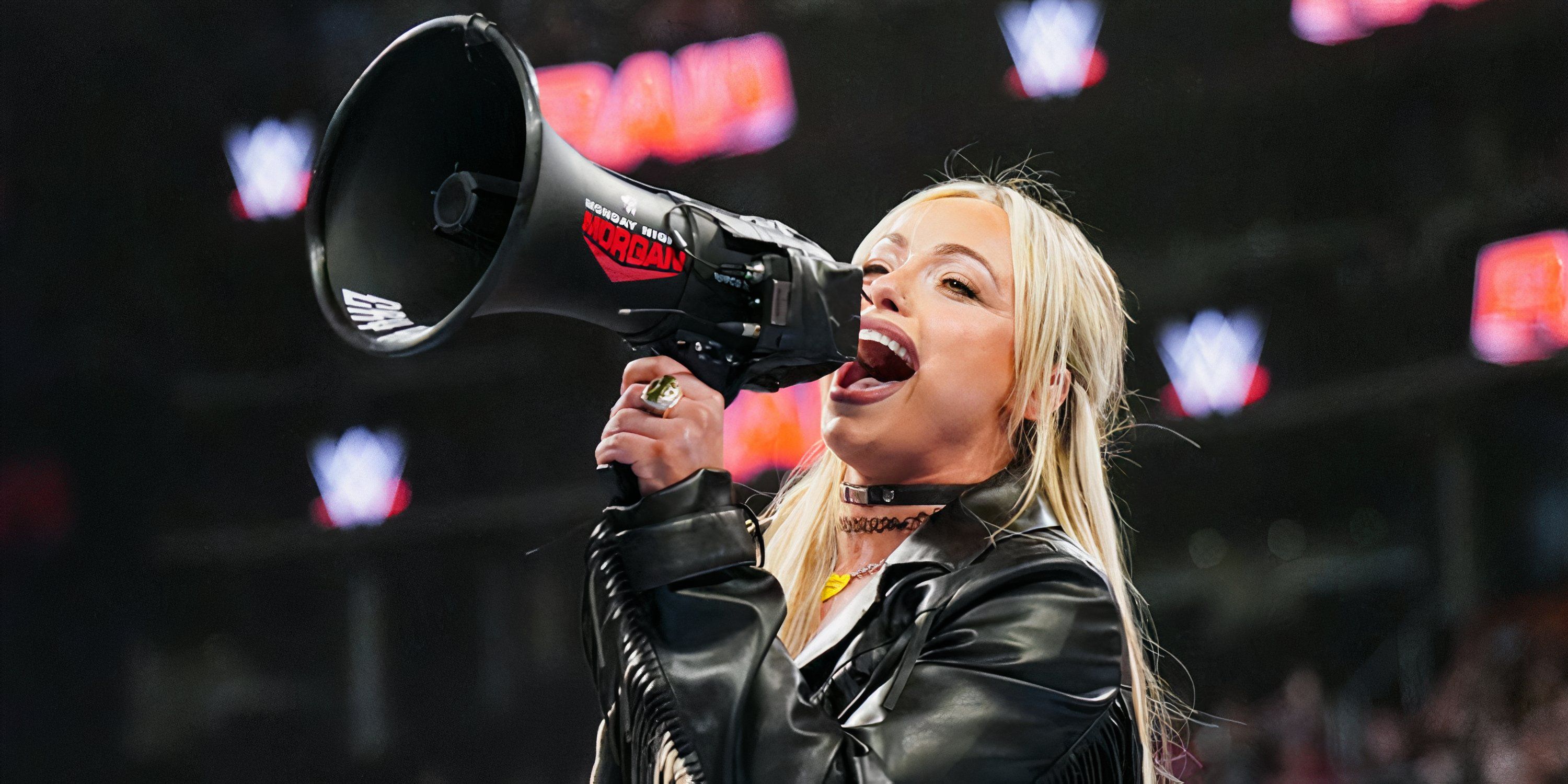 Liv Morgan poses with a megaphone during WWE RAW.