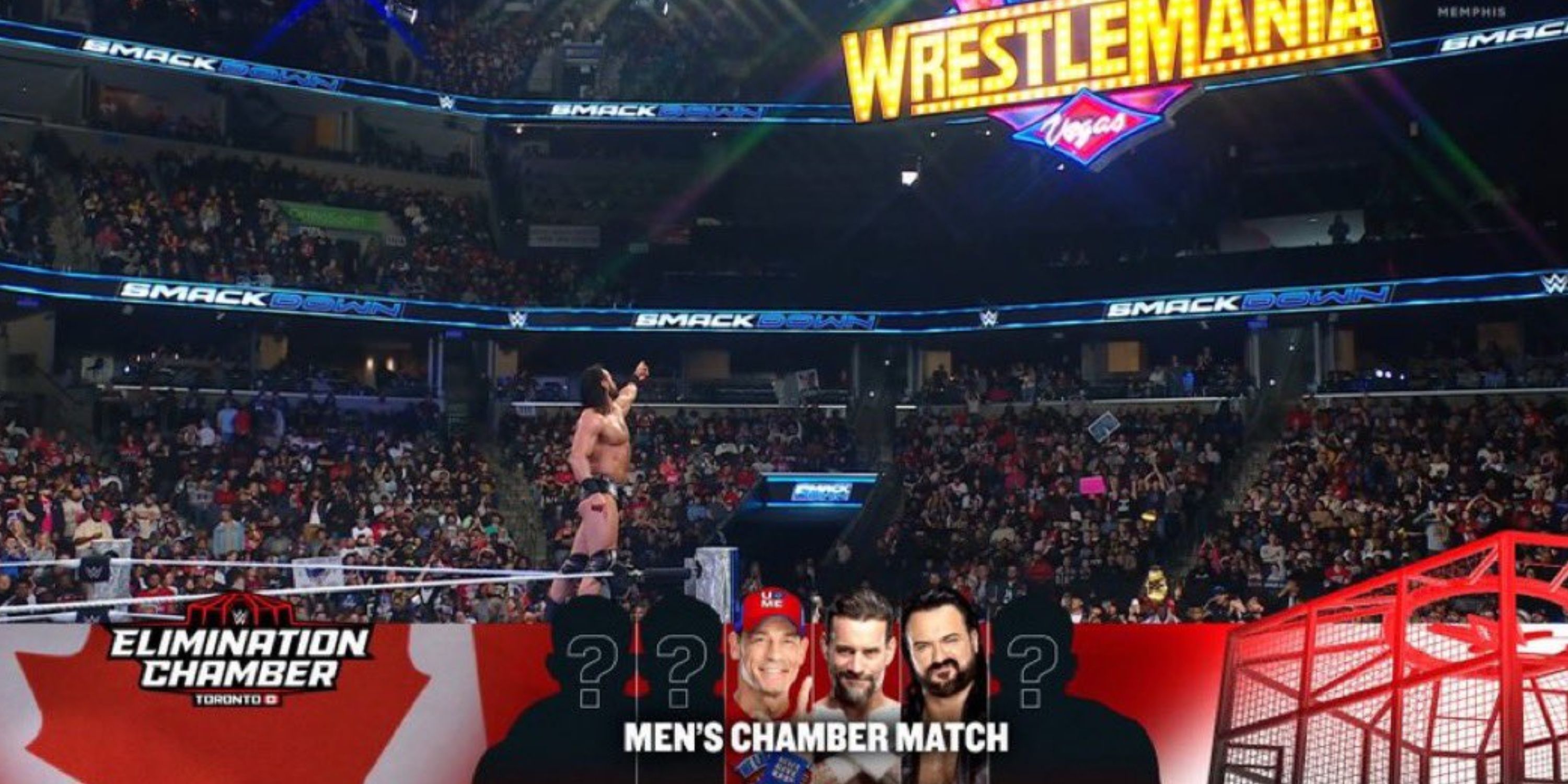 Drew McIntyre points at the WrestleMania sign.