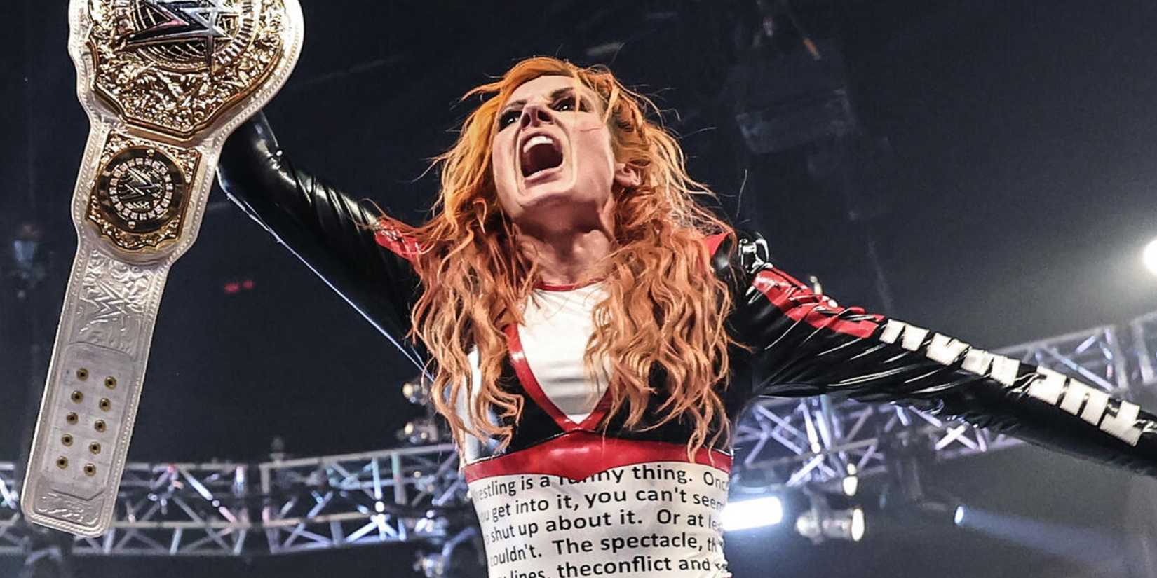 WWE's Becky Lynch with the Women's World title belt.