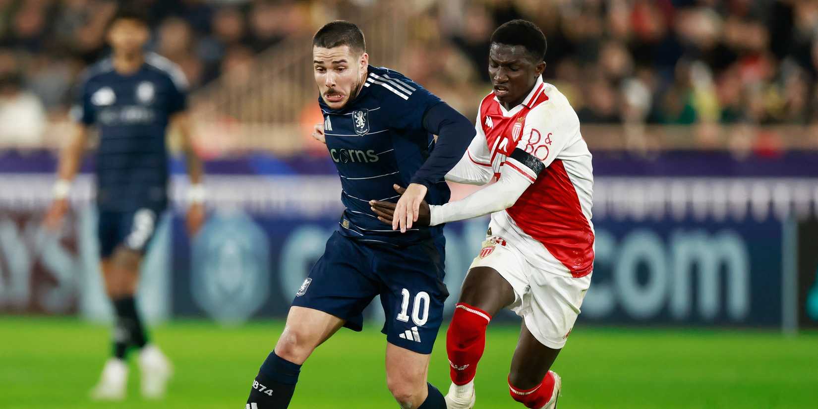 Lamine Camara with Emiliano Buendia Monaco vs Aston Villa