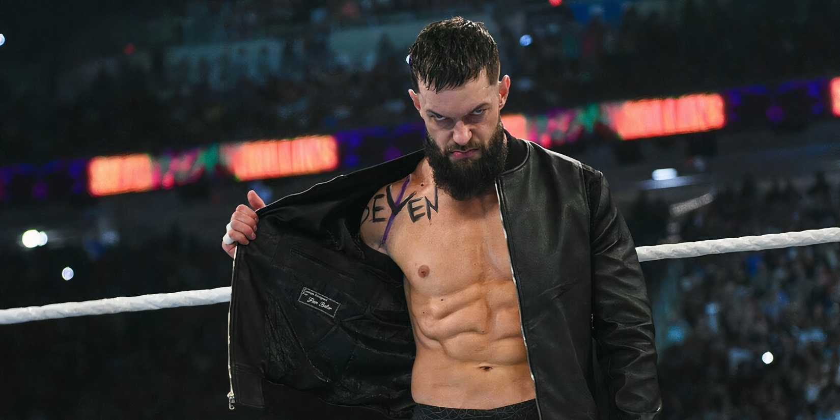 Finn Balor makes his entrance at a WWE show.
