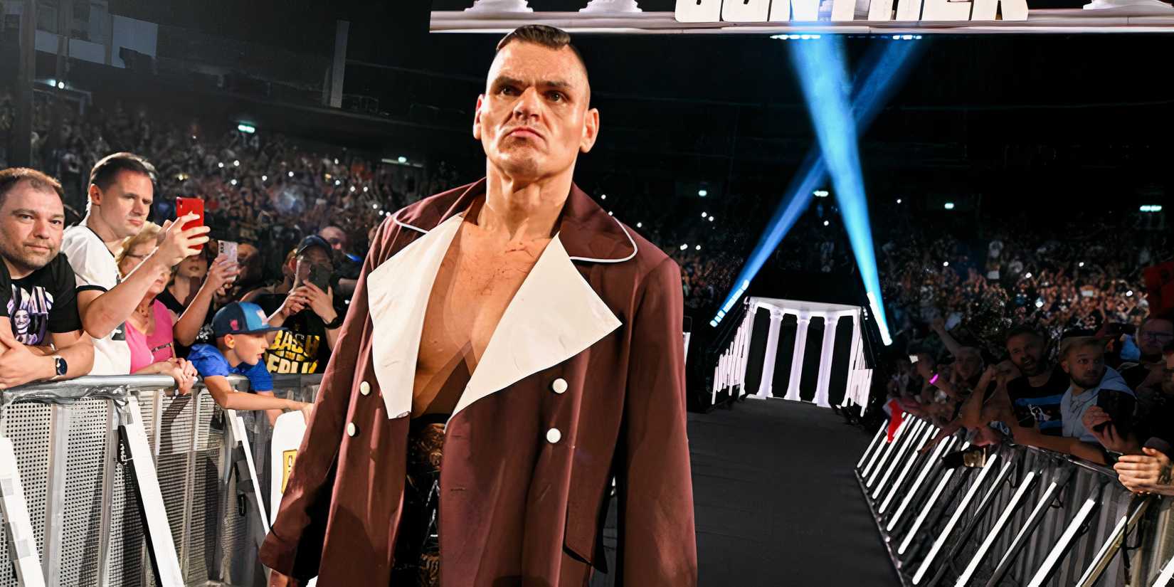 Gunther makes his entrance at a WWE show.
