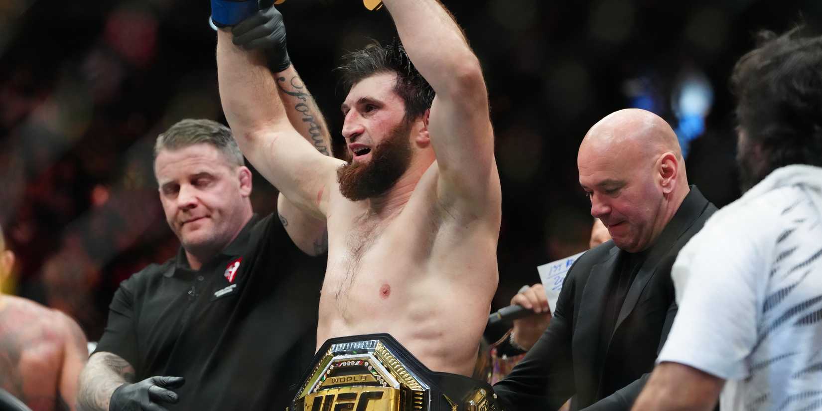 Magomedov Ankalaev celebrates with UFC title