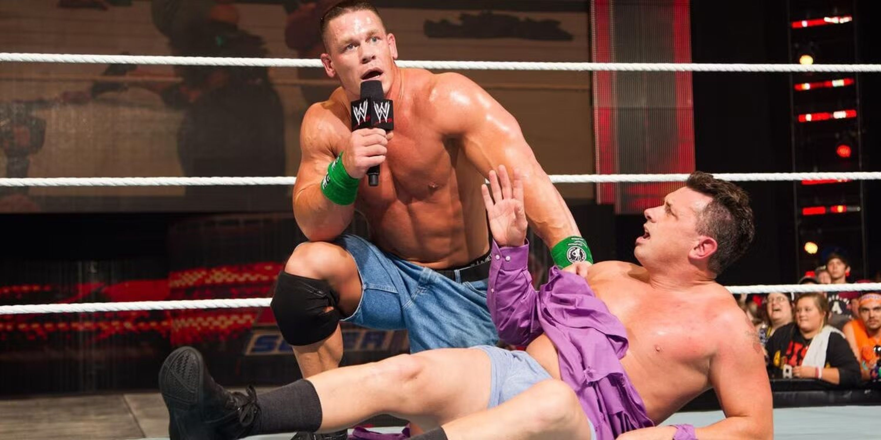 John Cena and Michael Cole having a match on WWE Raw.