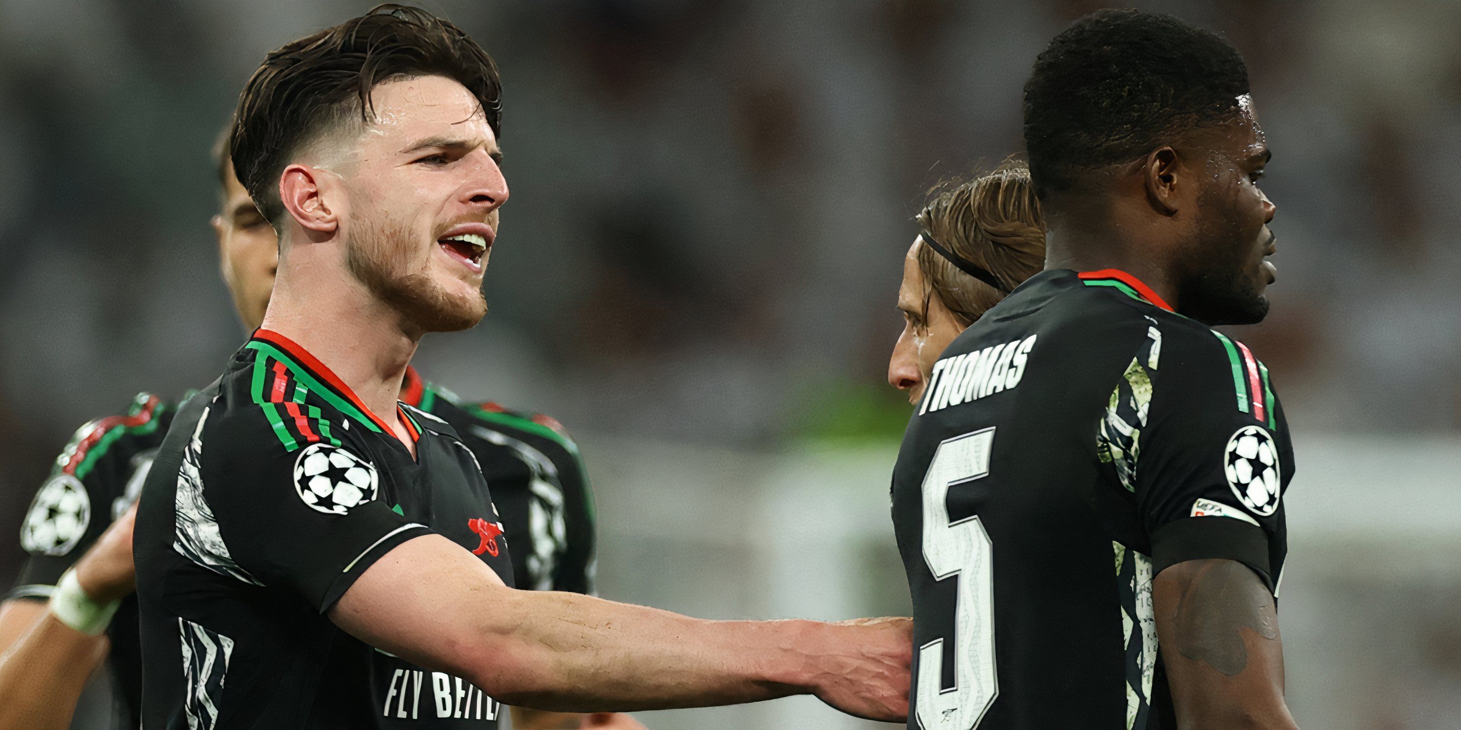 Arsenal's Declan Rice moans at Thomas Partey