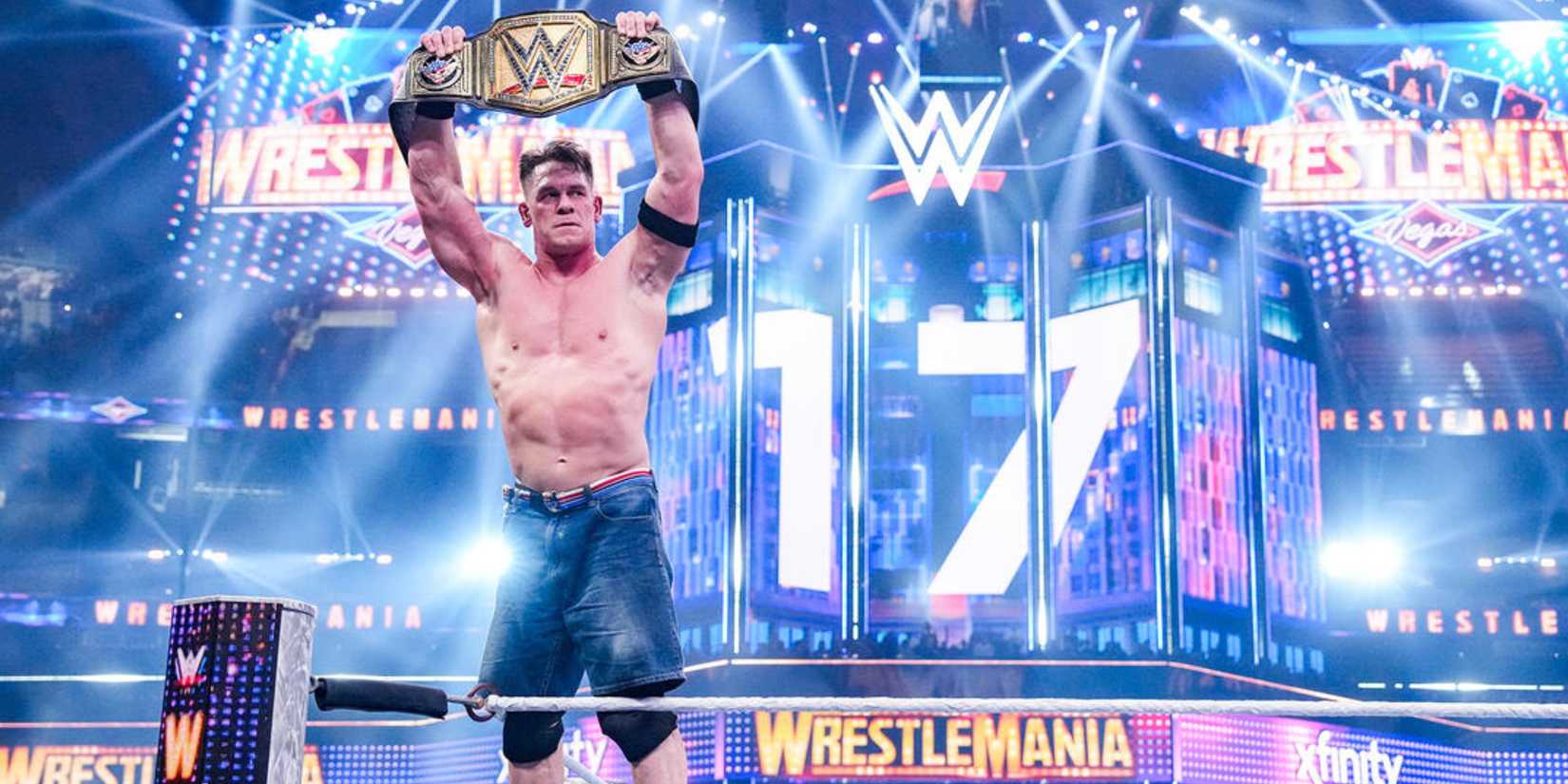 WWE's John Cena holding the Undisputed WWE title belt at WrestleMania 41.