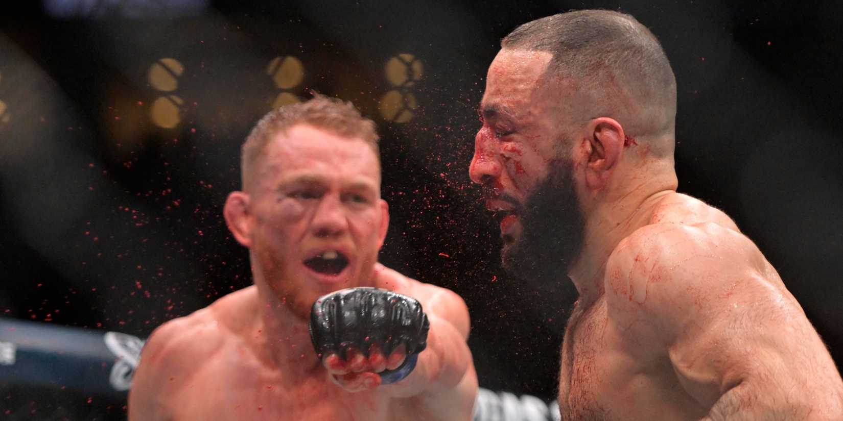 Belal Muhammad taking a punch off Jack Della Maddalena