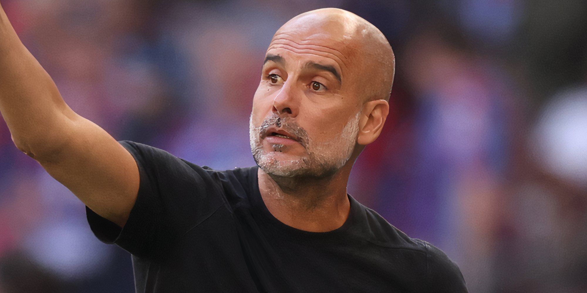 Manchester City manager Pep Guardiola pointing