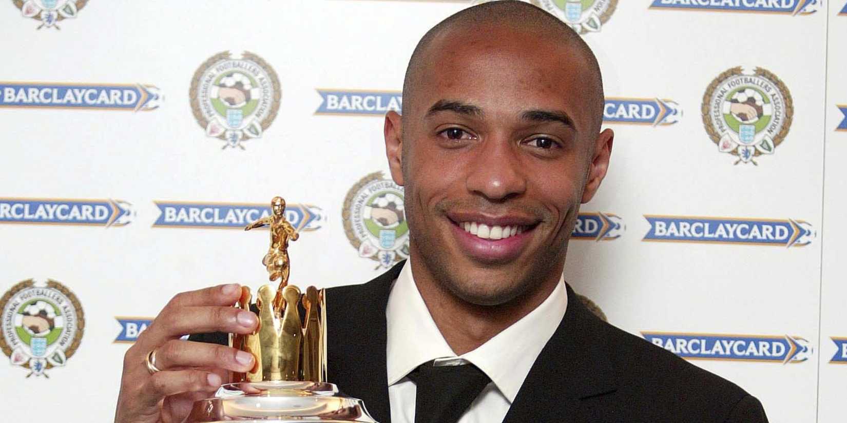 Arsenal's Thierry Henry proudly shows off his award for PFA Player of the Year
