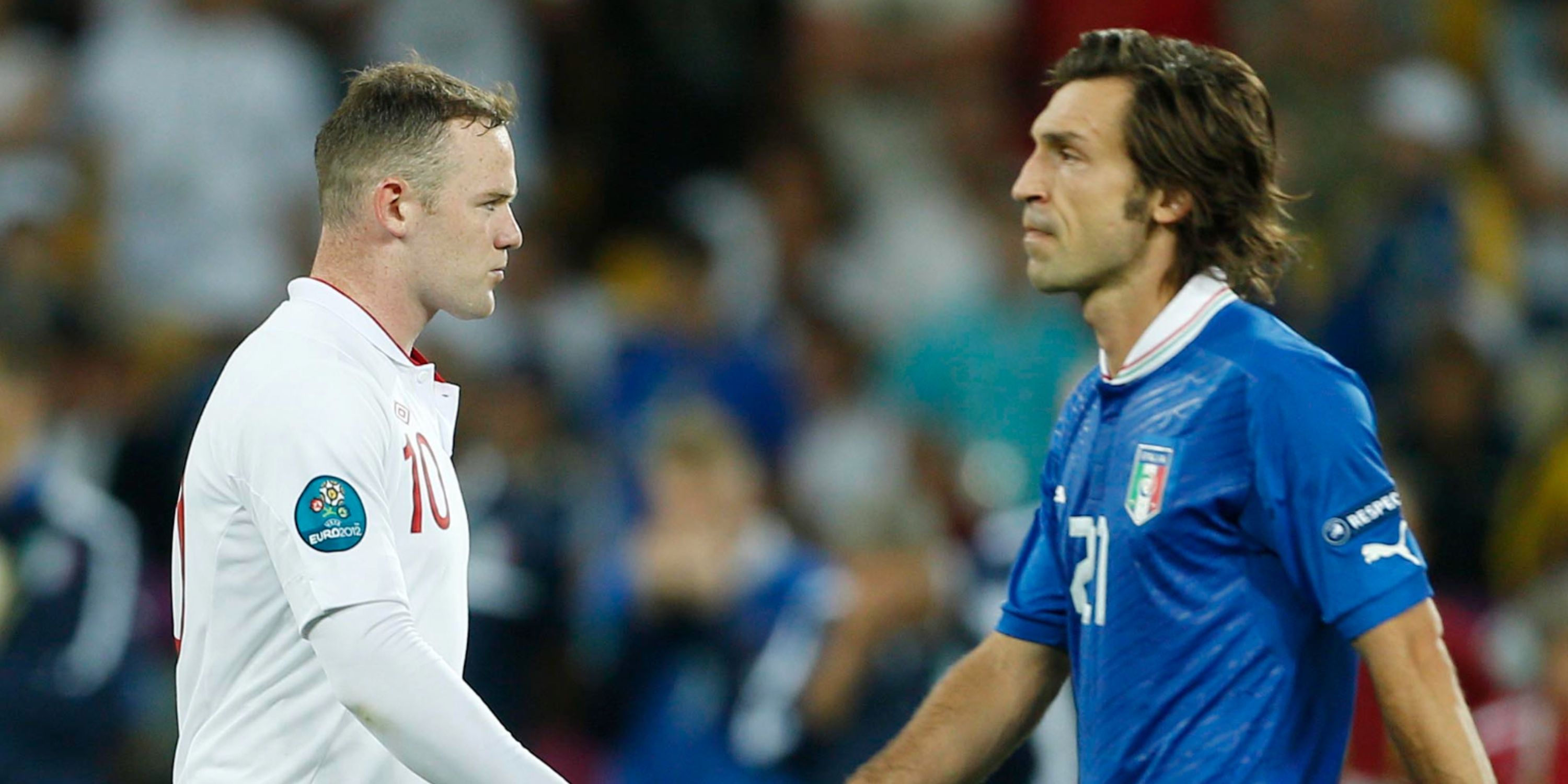 Italy's Wayne Rooney (L) and Italy's Andrea Pirlo during the penalty shootout