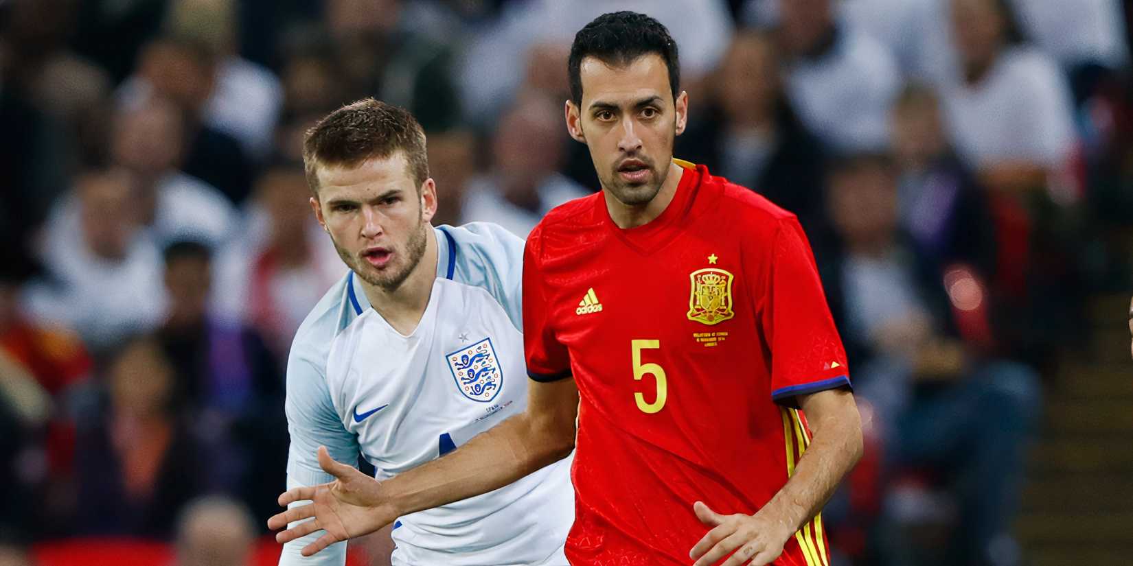 Spain's Sergio Busquets in action with England's Eric Dier