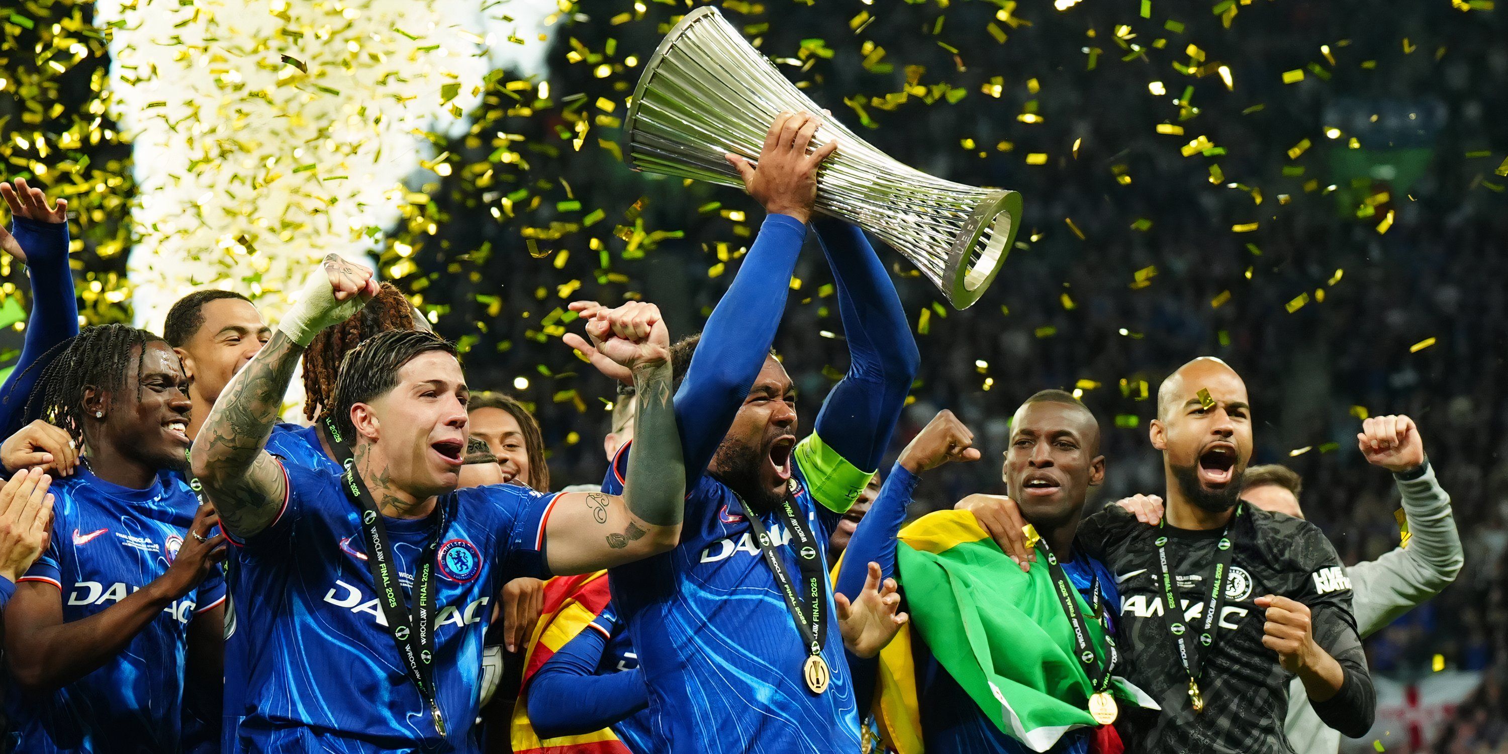 Chelsea celebrating with the UEFA Conference League trophy
