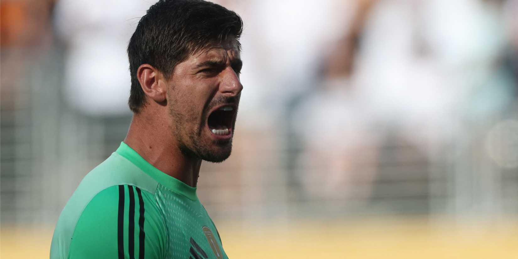 Thibaut Courtois celebrating after making a save