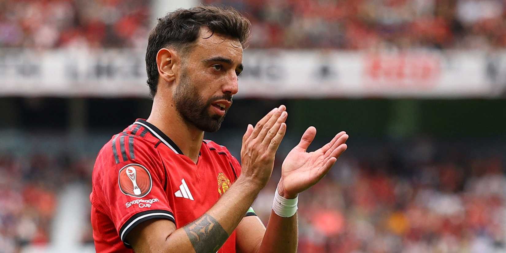 Bruno Fernandes applauding Manchester United fans