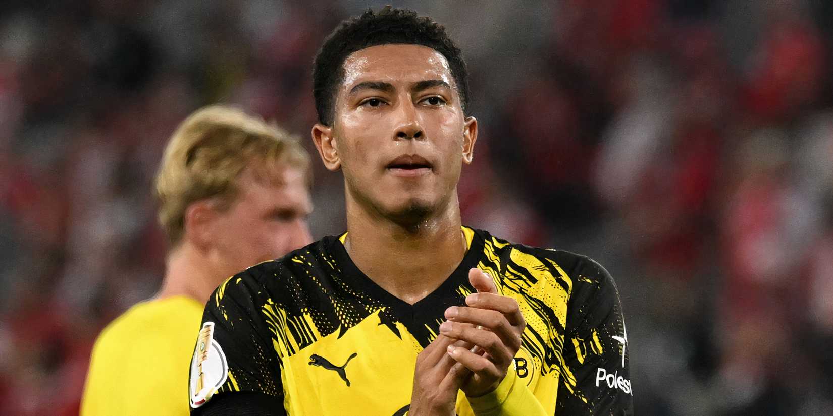 Borussia Dortmund's Jobe Bellingham celebrates after the match