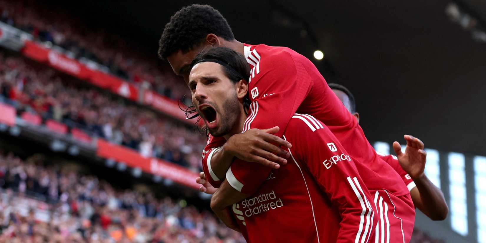Liverpool's Dominik Szoboszlai celebrates scoring vs Arsenal.