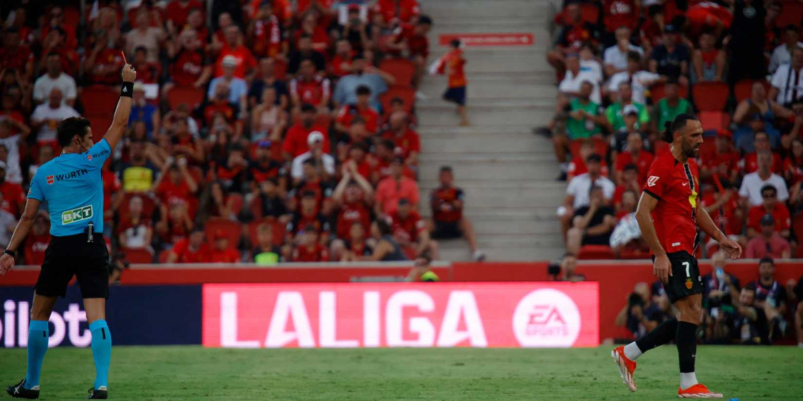 Vedat Muriqi leaving the pitch after getting sent off against Barcelona
