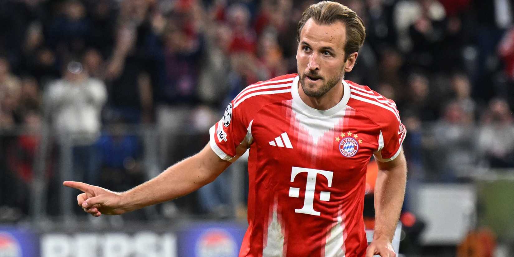 Harry Kane celebrating after scoring a brace for Bayern Munich in the UEFA Champions League against Chelsea