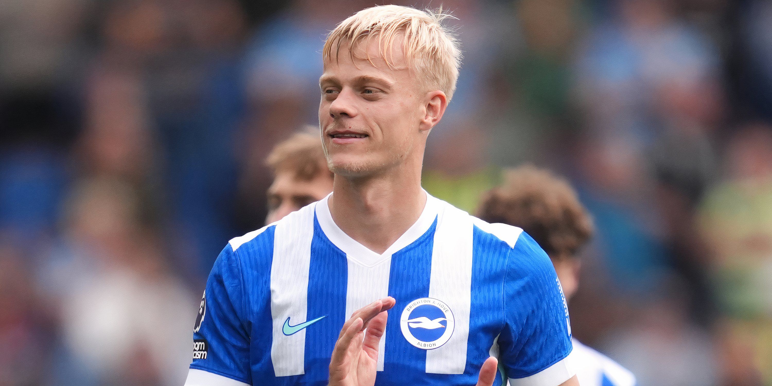 Jan Paul van Hecke applauding the Brighton & Hove Albion supporters