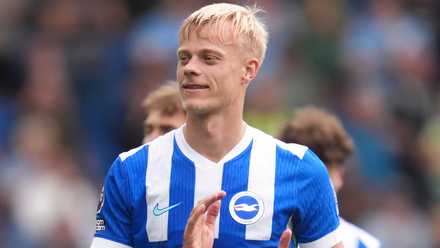 Jan Paul van Hecke applauding the Brighton & Hove Albion supporters