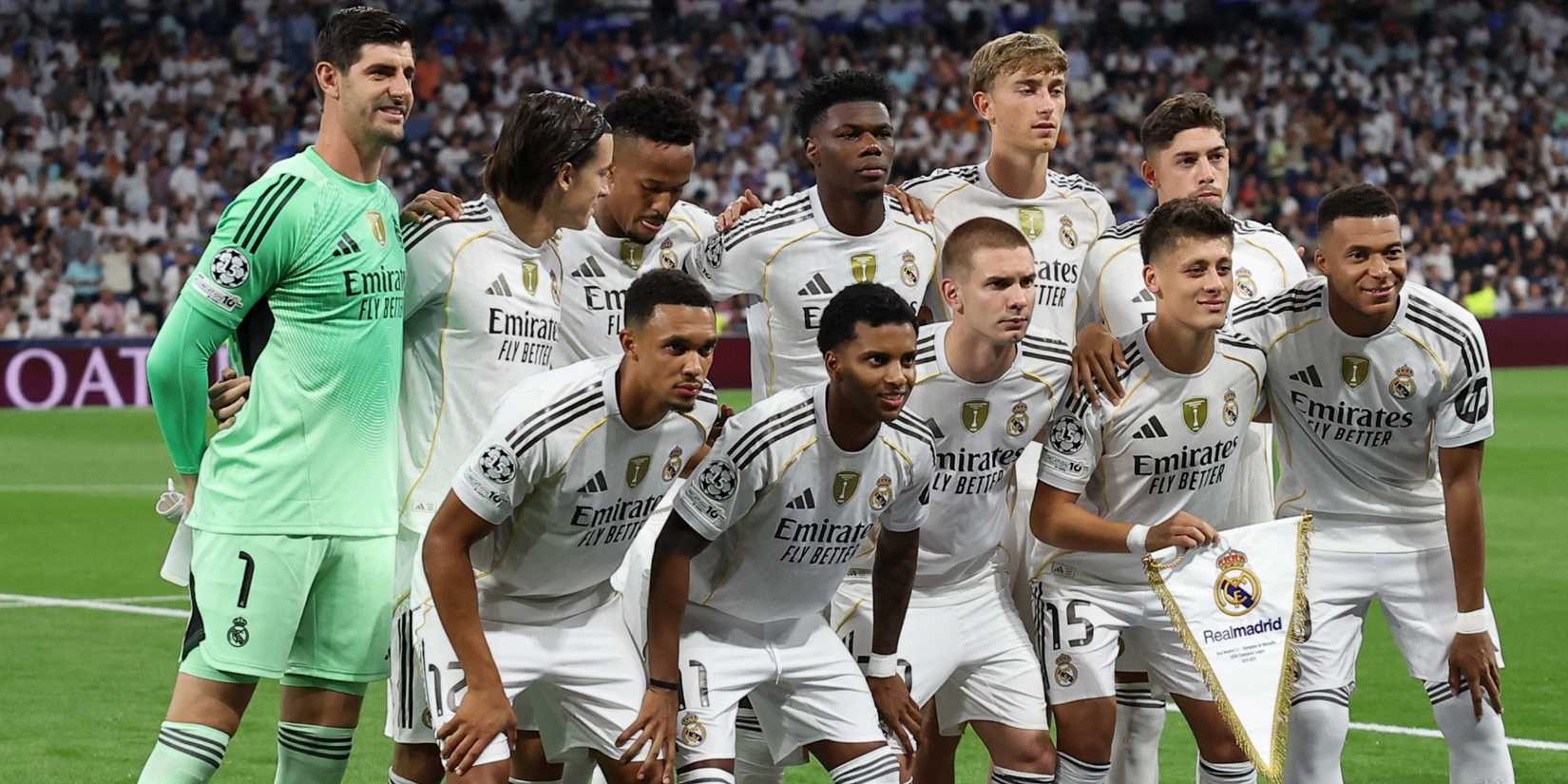 Real Madrid players pose for a team group photo before the match vs Marseille.