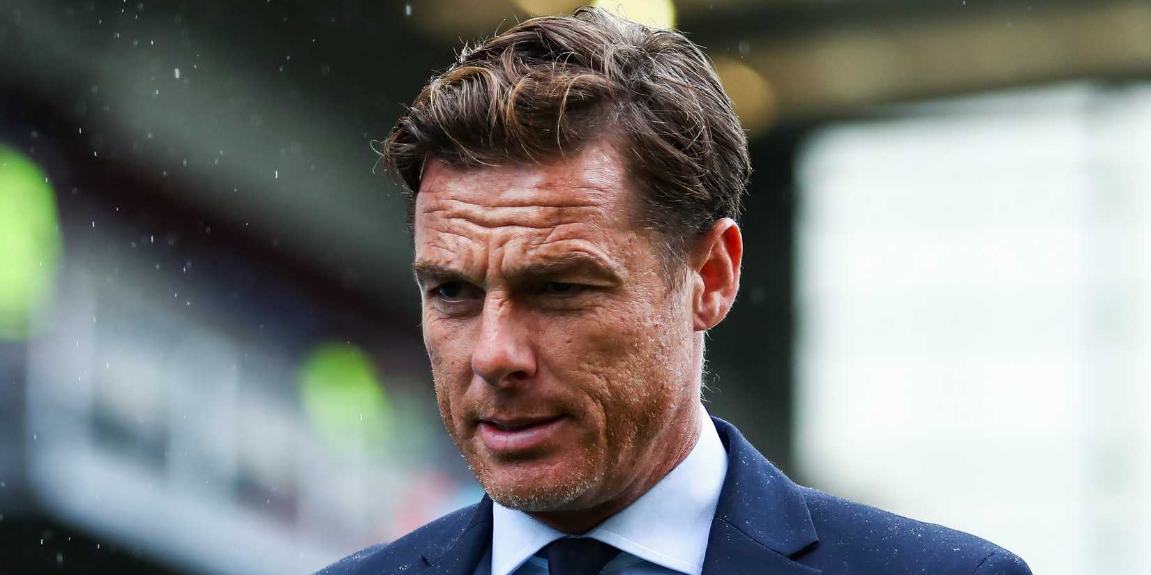 Burnley boss Scott Parker watching on